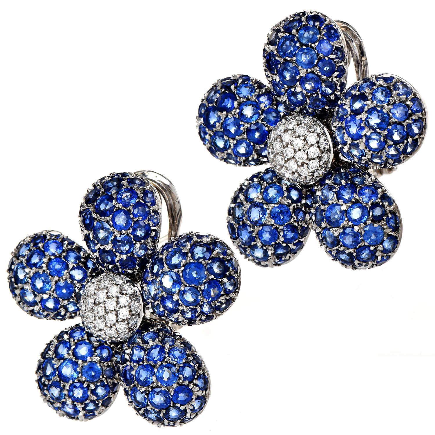 These Stylish 18K White Gold, Pave Diamond & Sapphire Earrings were

inspired by a five-petal Spring Flower motif.

The center is brightened by (58) Genuine Diamonds, weighing collectively 1.06 carats in total, G-H color, and VS clarity.

The 10