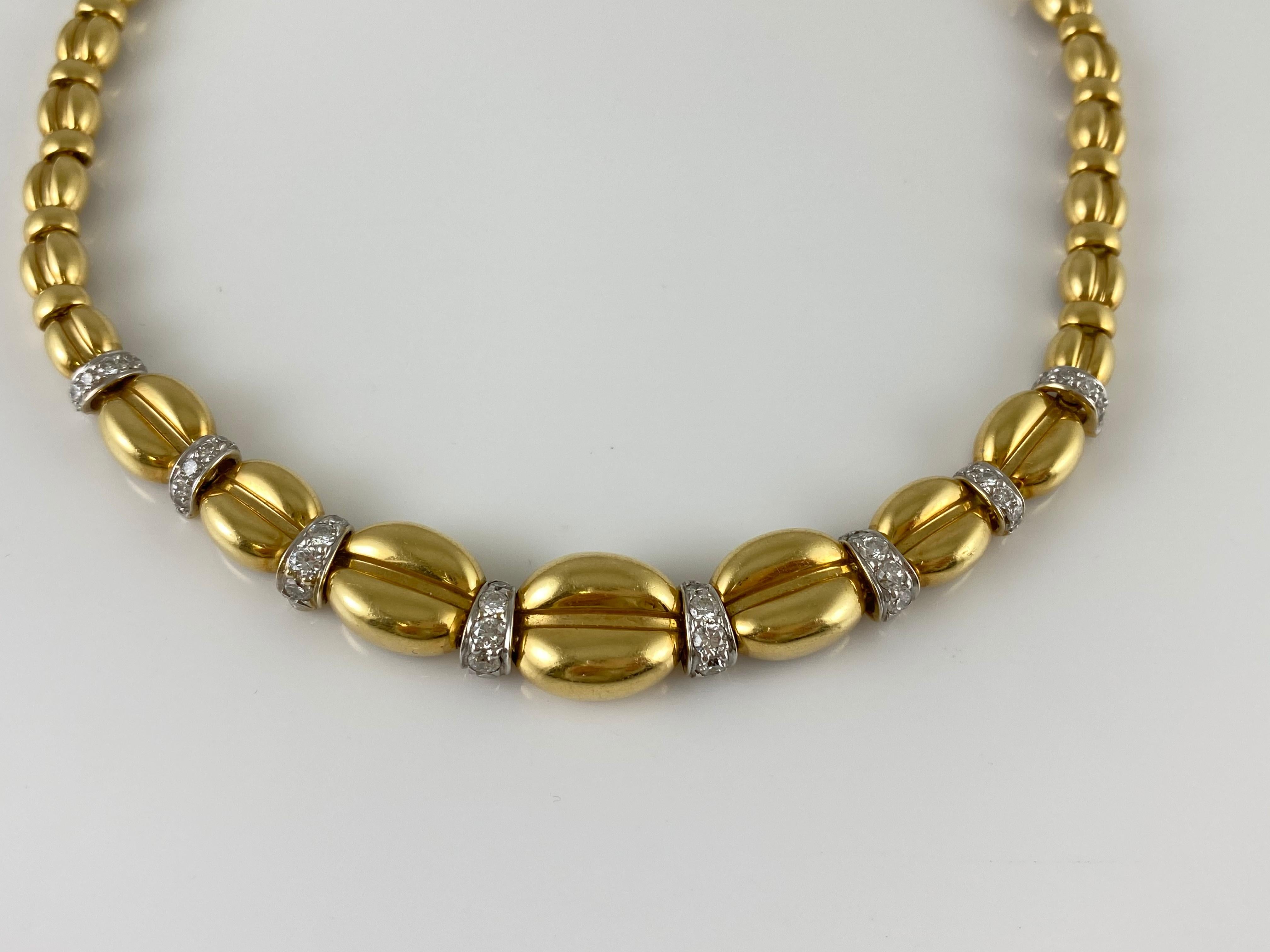 The necklace is finely crafted in 18k yellow gold wirh diamonds weighing approximately total of 2.00 carat.
The necklace weighing approc=ximately total of 50.00 dwt.
The length: 16.50inch