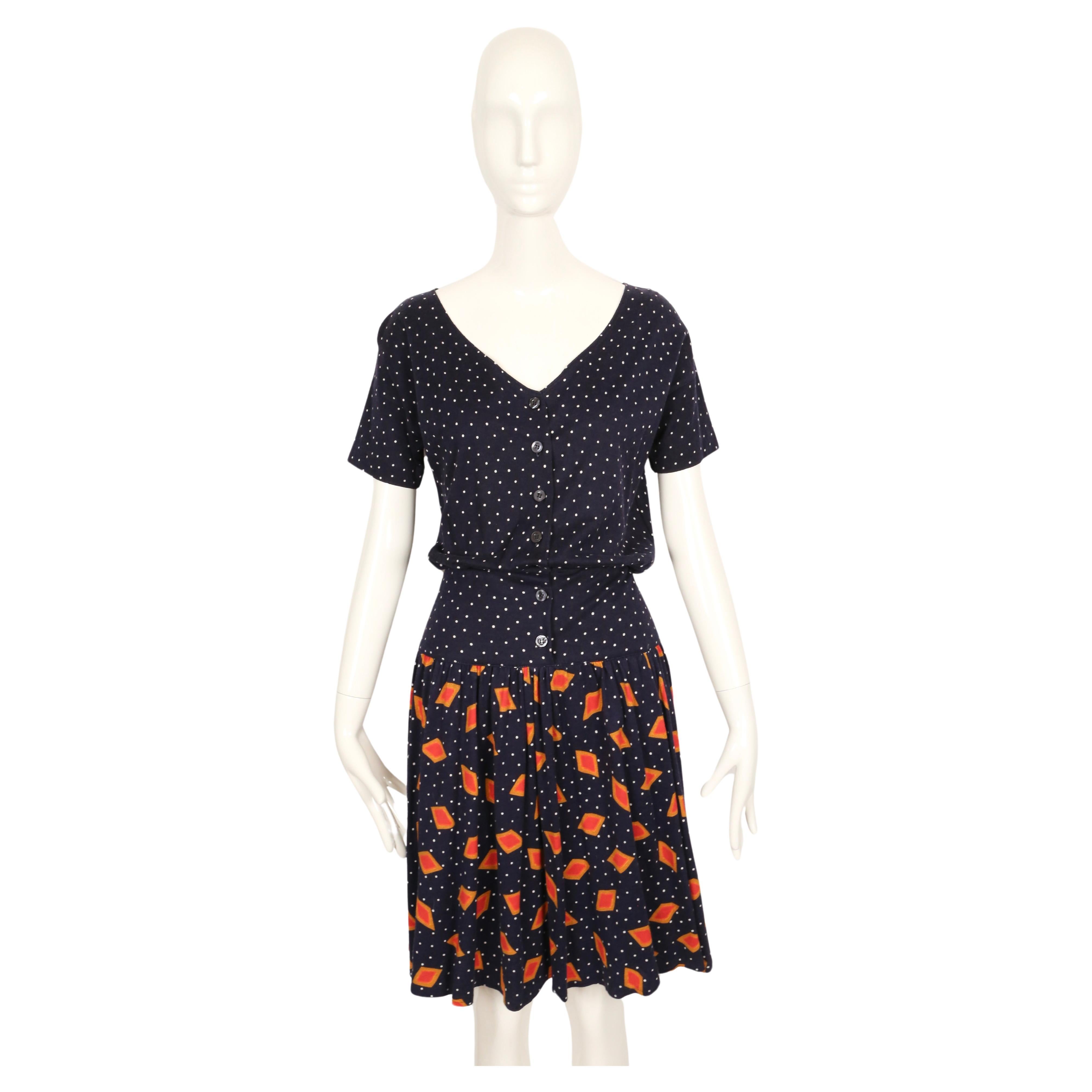 Navy blue abstract printed dress by Diane Von Furstenberg dating to the 1980's. No size is indicated. The dress was not clipped on the size 2 mannequin. Approximate measurements: bust 38