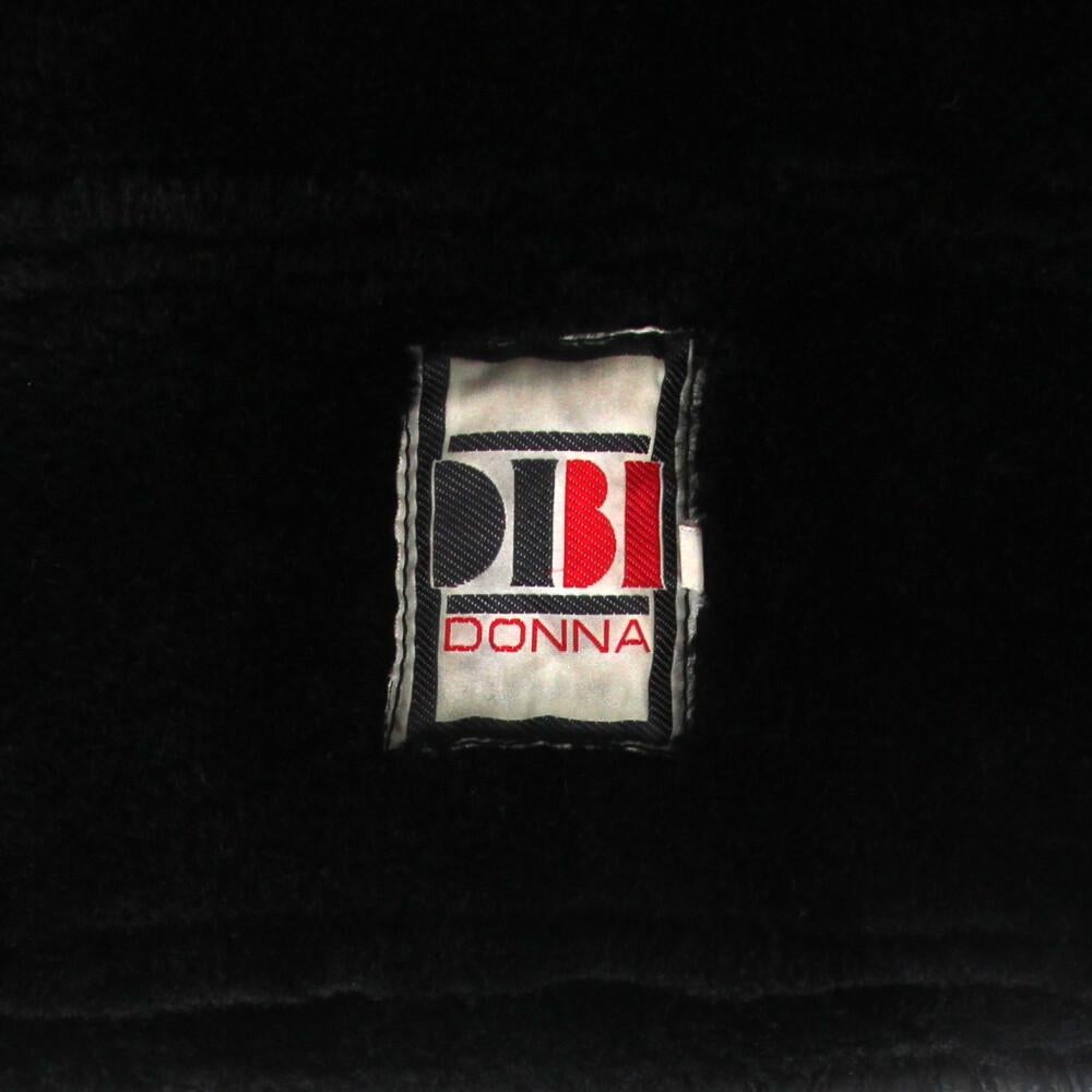1980s Dibi vintage black sheepskin jacket with black fur interior 2