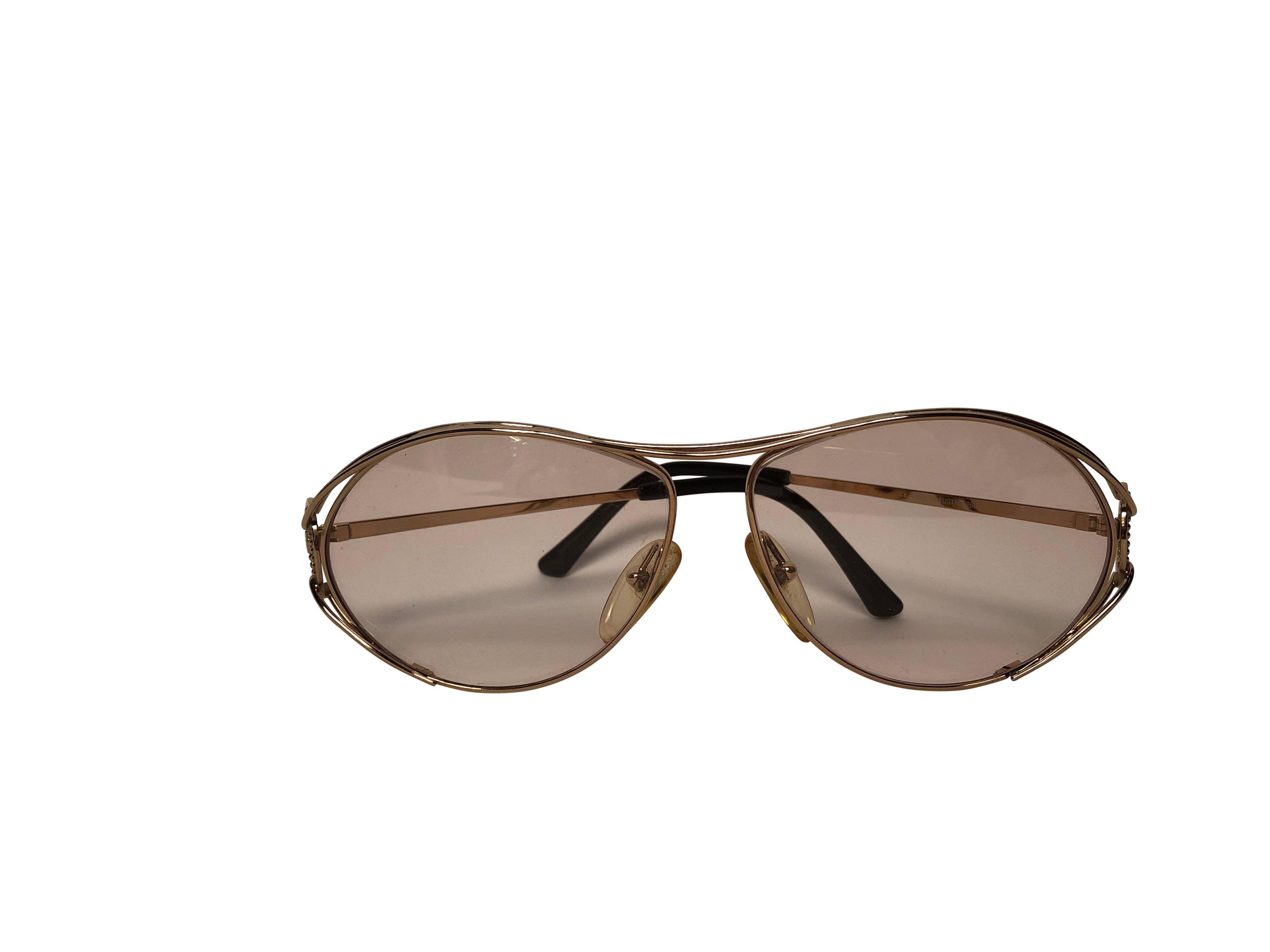 1980's Gold toned DIOR 2665 sunglasses with CD logo at temples.

Lens colour: 40 (clear, very slightly pink tinted)

Size: 58 12 125