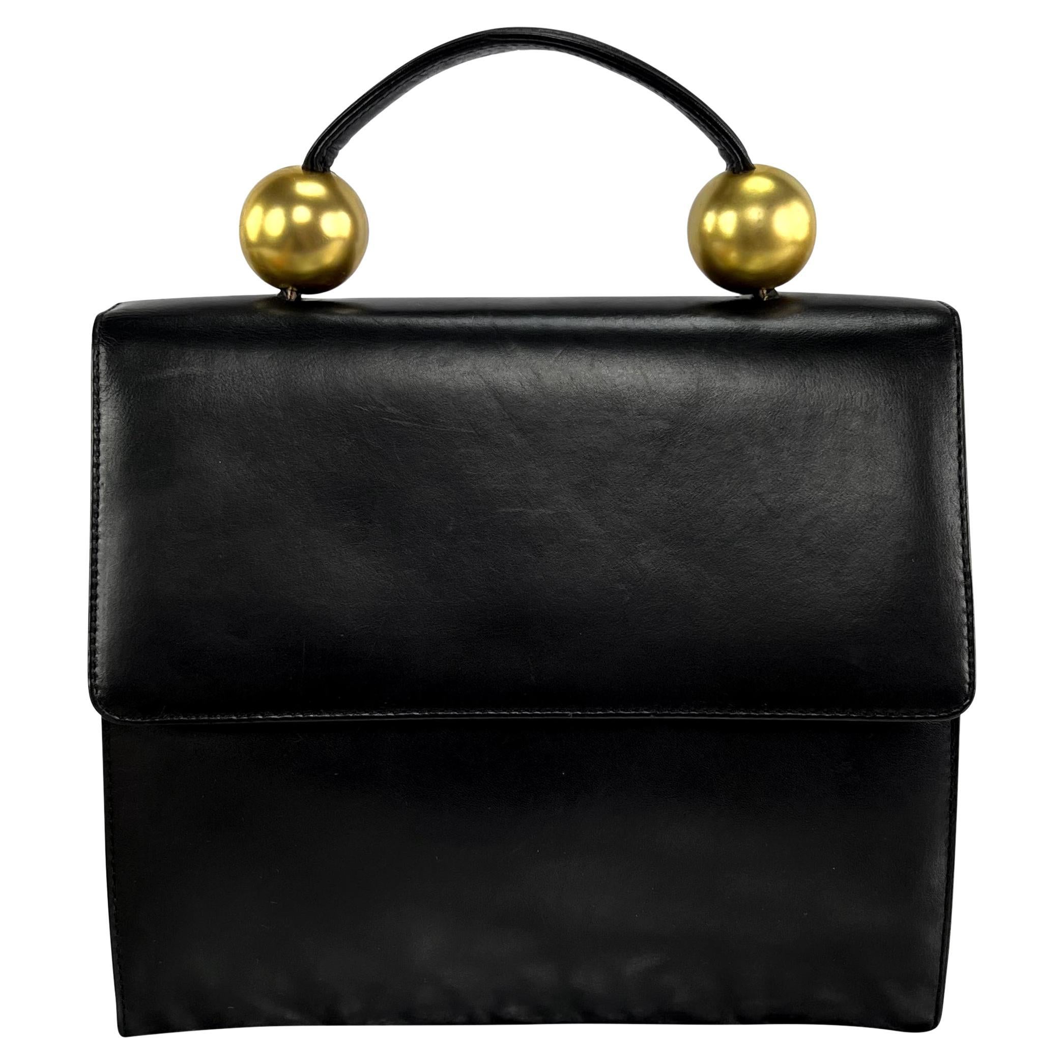 Bolso Crossbody de asa superior de piel negra Donna Karan Gold Bauble de los años 80 en venta