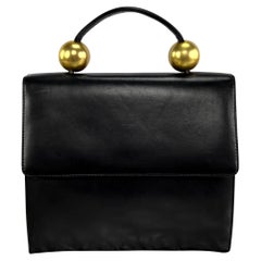 1980s Donna Karan Gold Bauble Black Leather Top Handle Crossbody Bag