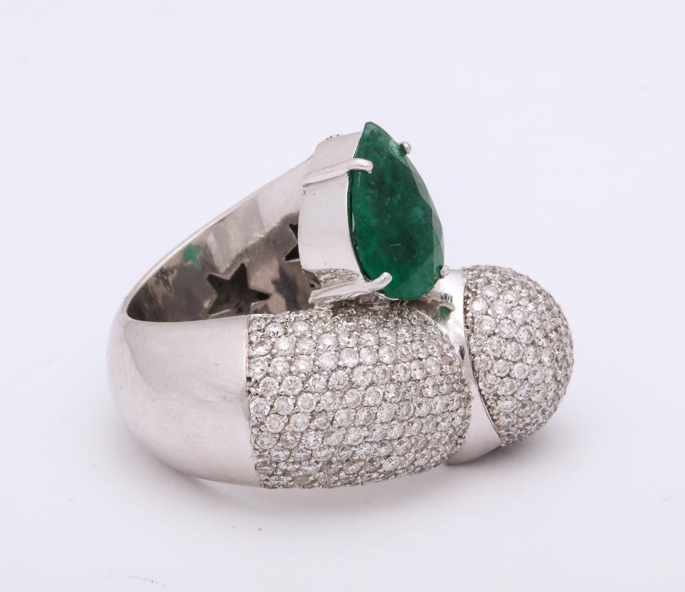 Women's 1980s Dramatic Pear Shaped Emerald with Diamond Bypass Gold Cocktail Ring