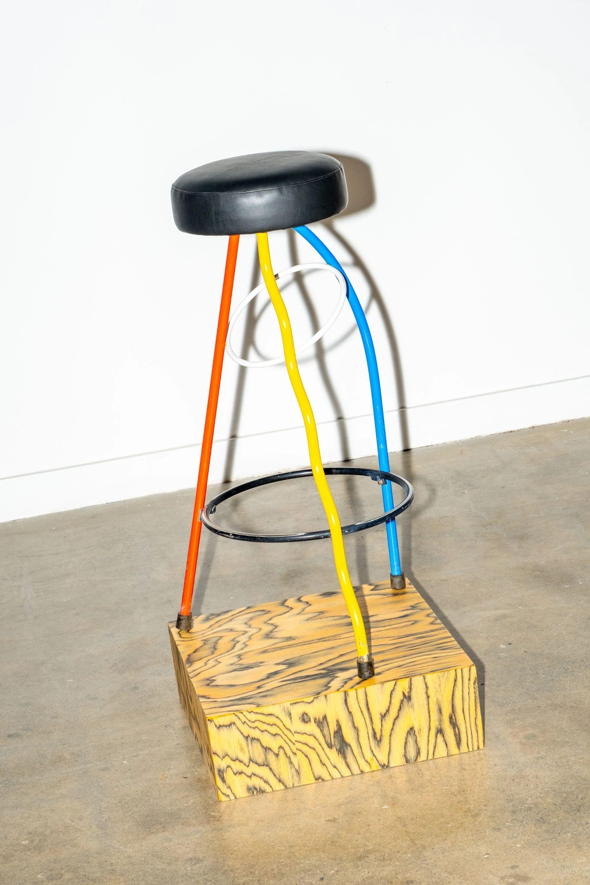 Playful stool in primary colours with an eighties pedigree. Spanish artist Javier Mariscal (b. 1950) first created it for the Duplex Bar in Valencia in 1980, and it was commercialized the following year. Its cartoony lines give it a lively energy.