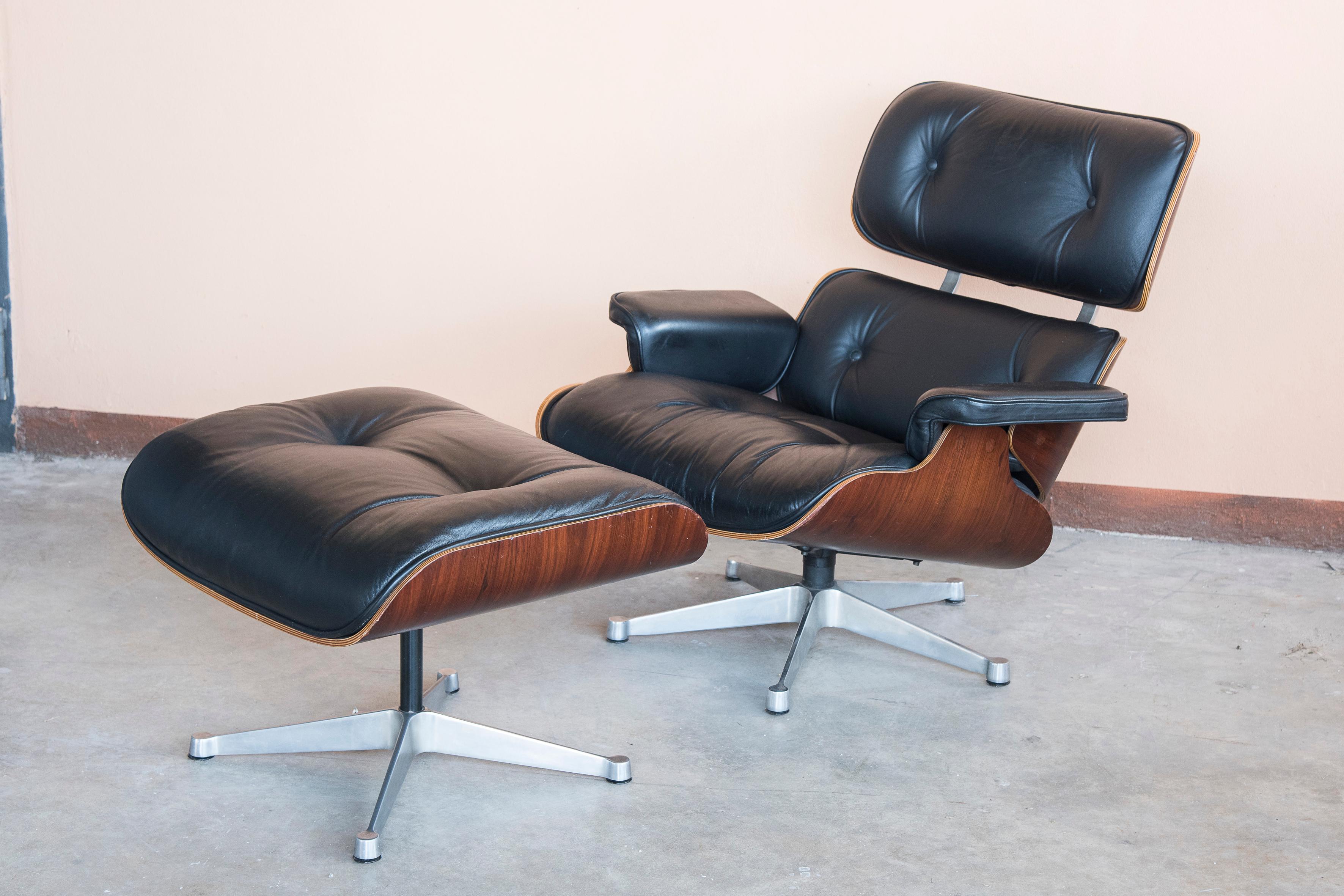 Charles Eames lounge chair with footrest, ICF production, 1980s.

In wood, leather and polished aluminum.

The Lounge Chair is intact and original in every detail it Presents serial numbers and ICF stickers.