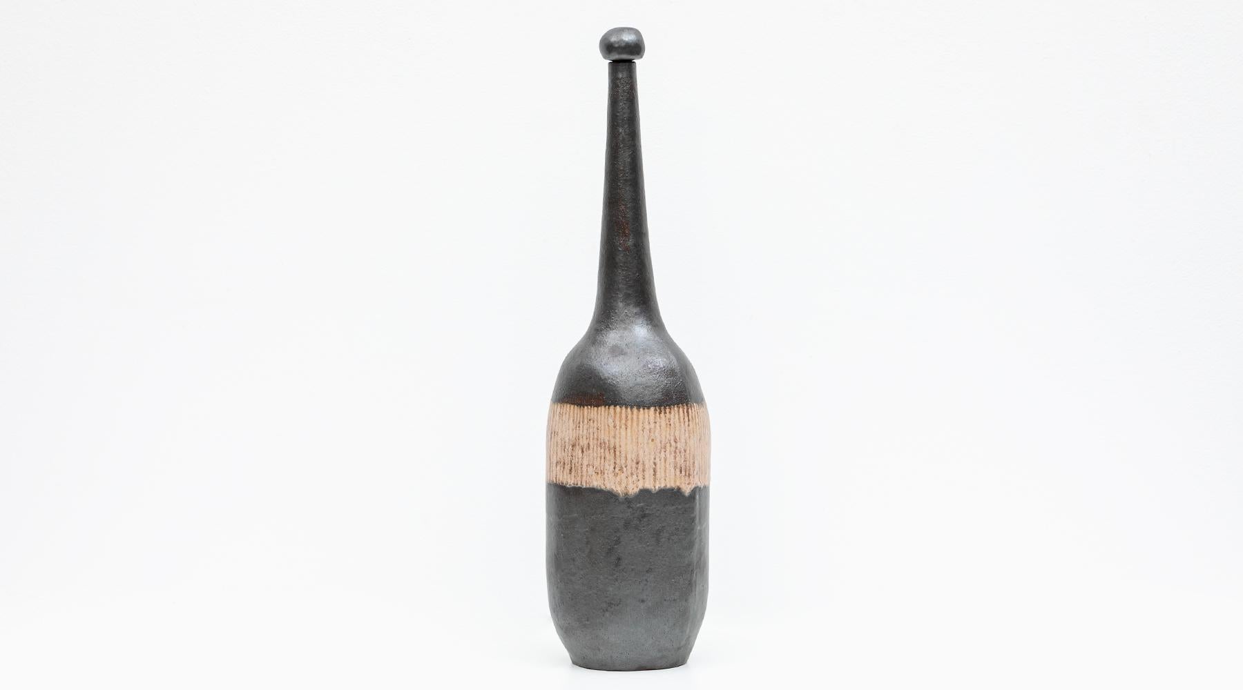 Sculptural object, single bottle, ceramic, glazed, Bruno Gambone, Italy, 1980s.

Another outstanding object, not only striking due to the given height, but also the colouring and composition. The sculptural bottle comes with a cap and changes its