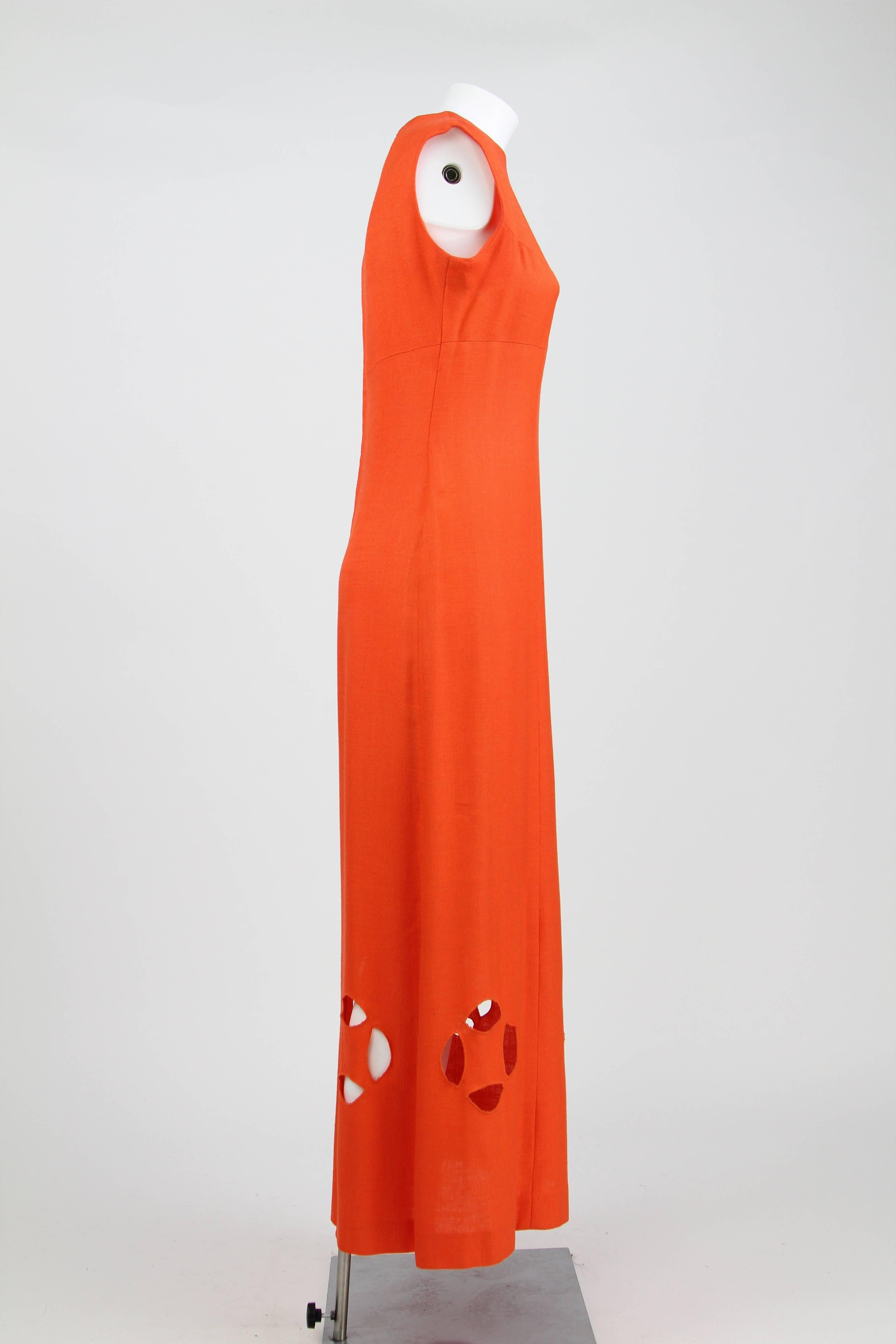 1980s Ein Fink Modell Orange Flax Mid - Length Dress featuring cut-outs, made in Italy.
In excellent conditions.
Size EU 40.