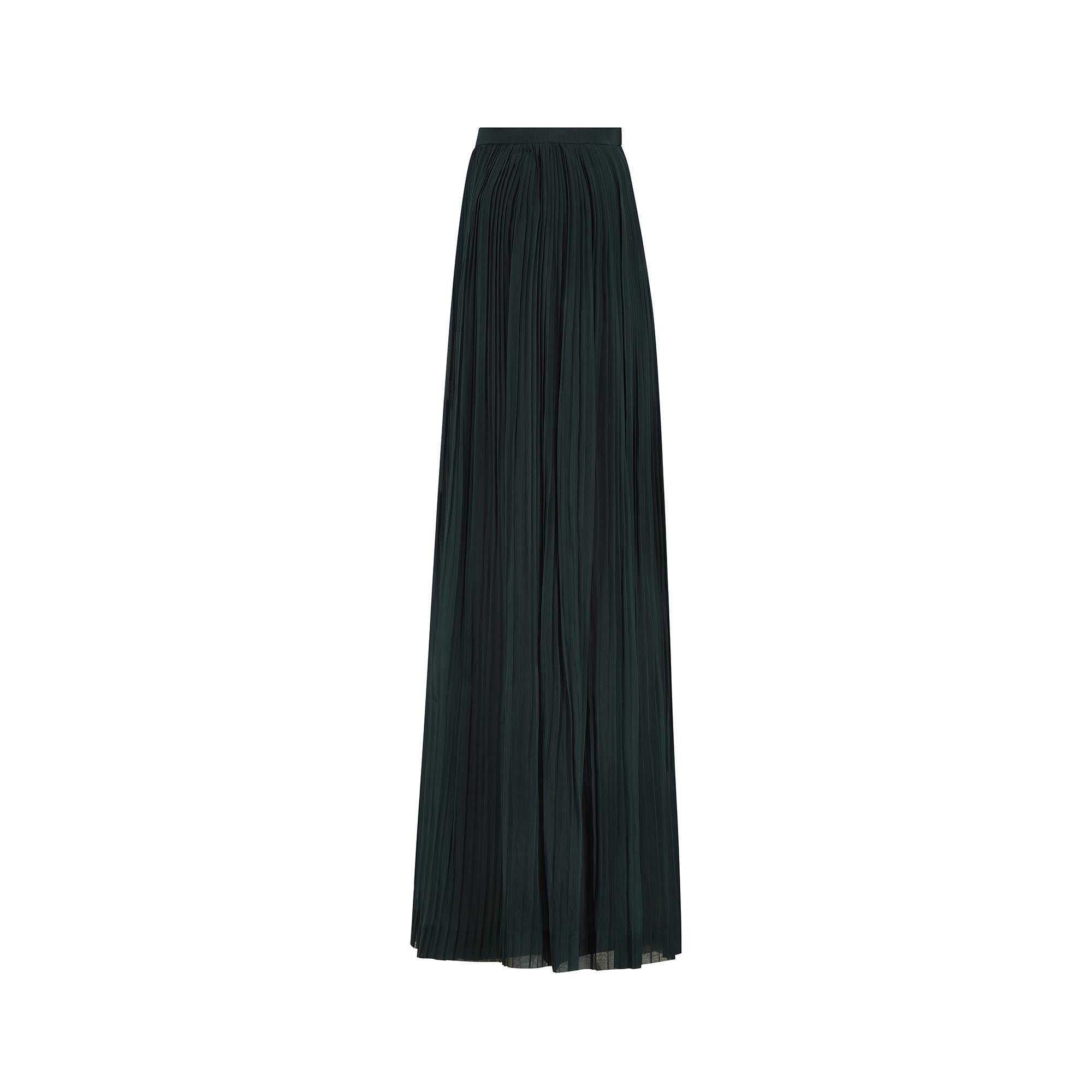 The House of Emanuel Ungaro was founded in 1965 following the designer's stint at the Ateliers of both Cristobal Balenciaga and Andres Courreges and reached peak popularity in the 1980s. This elegant ankle-length skirt dates back to this era.