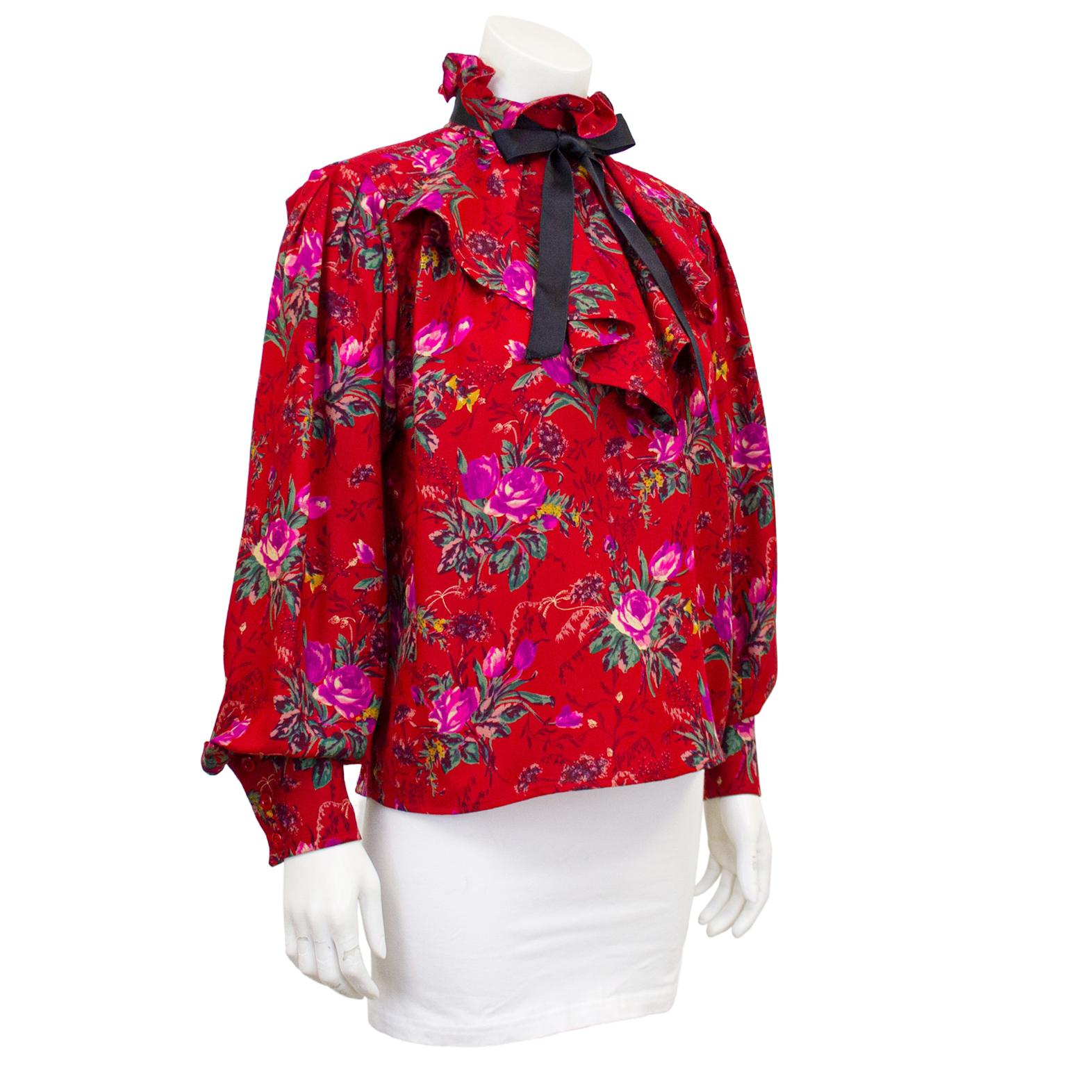 Emanuel Ungaro 1980's red wool floral shirt with ruffle collar and cascading jabot ruffle, finished with a black satin tie ribbon at the neck. Gathering below the shoulder. Cuff is cavalier style with French button fastening. The shirt buttons up