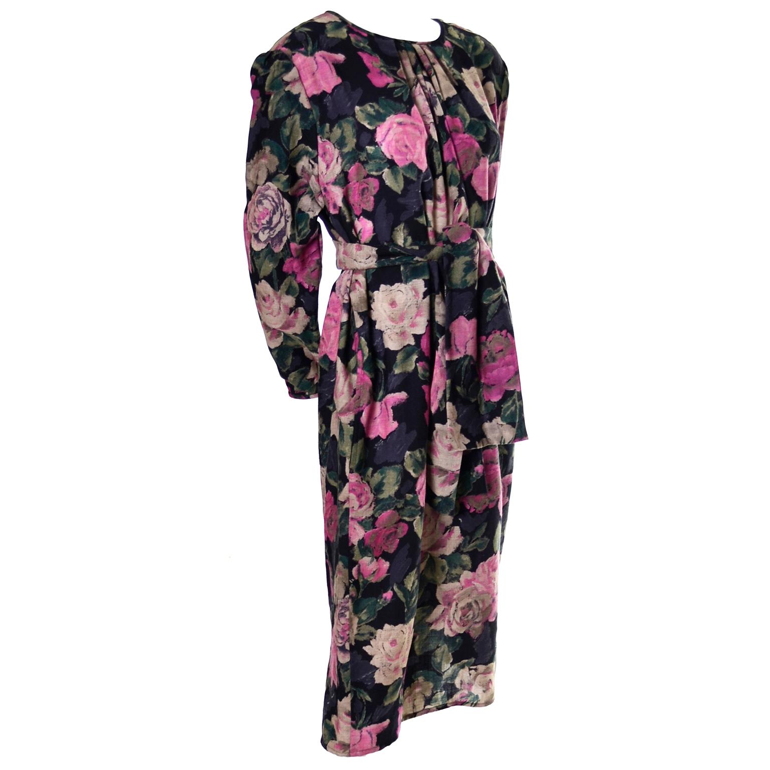 This great vintage late 1980's dress was designed by Emanuel Ungaro and bears the Ungaro Ter label. We love the gorgeous pink and cream floral print .This pretty vintage black Ungaro dress is made of 90% wool and 10% nylon and it has slight shoulder
