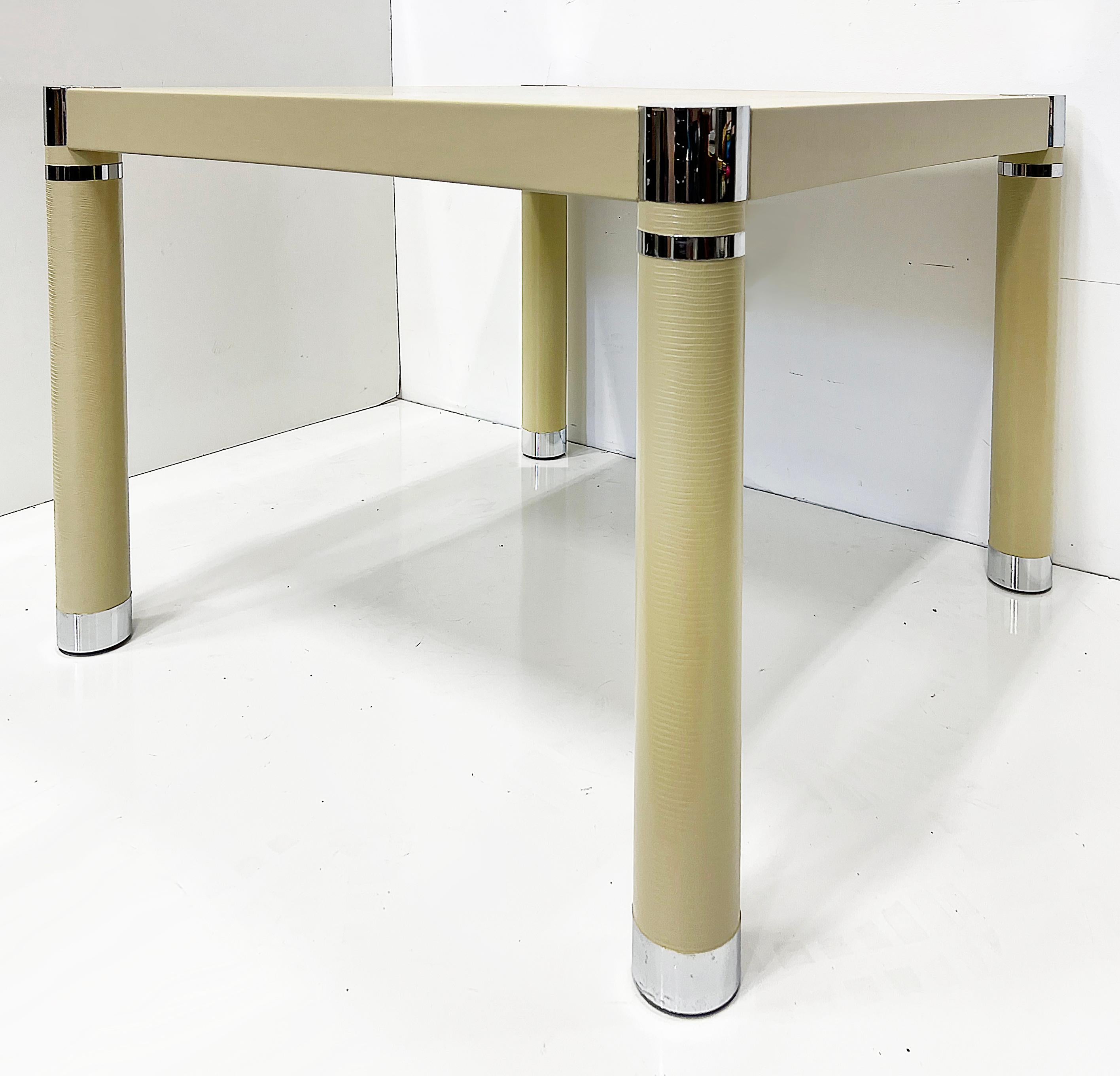 1980s Embossed Leather, Chrome Game Table, Karl Springer Style, Newly Restored

Offered for sale is a 1980s embossed leather game table in the manner of Karl Springer. The corners of the table have chrome caps   chrome caps  with chrome band details