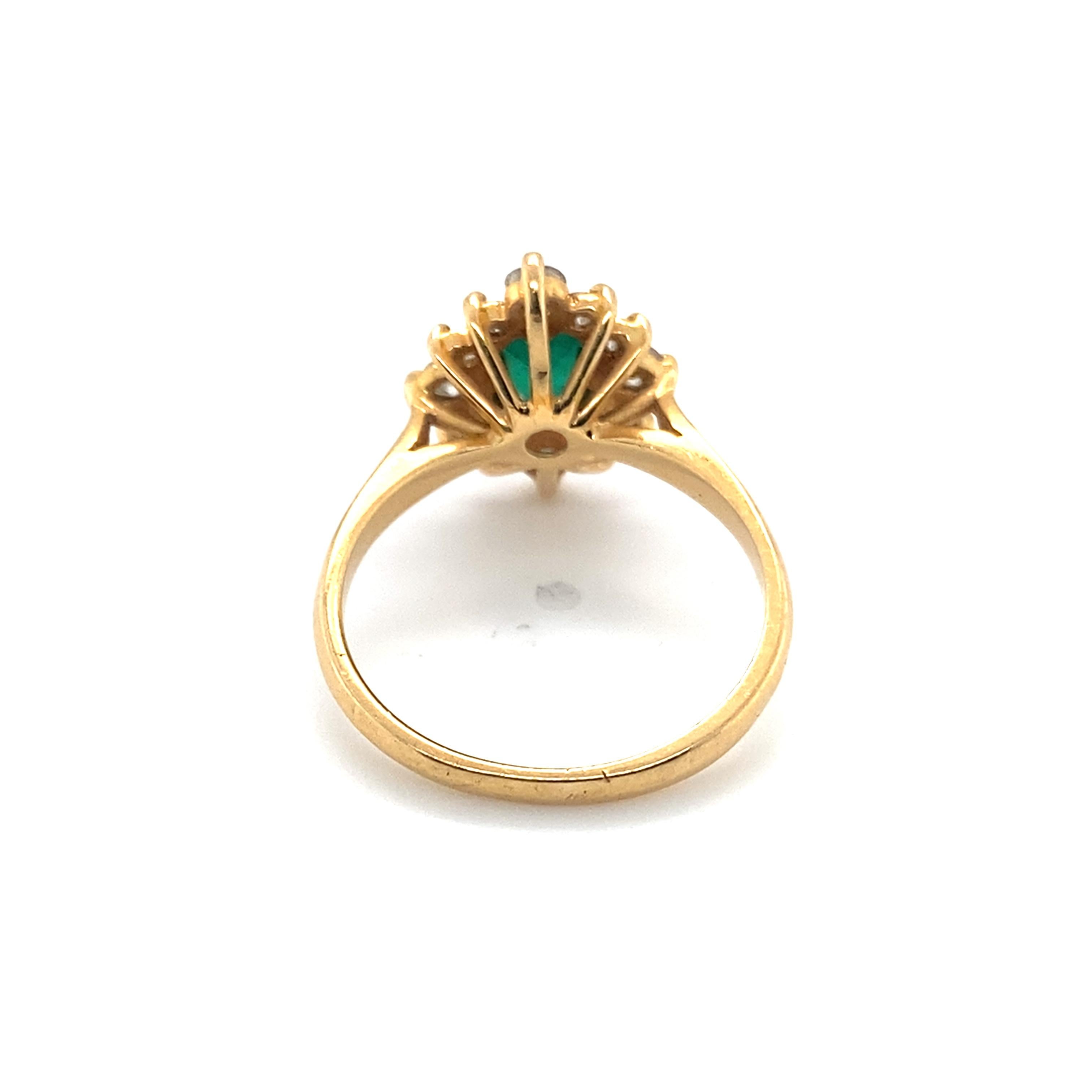 1980s Emerald and Diamond Cocktail Ring in 18 Karat Yellow Gold  In Excellent Condition For Sale In Atlanta, GA