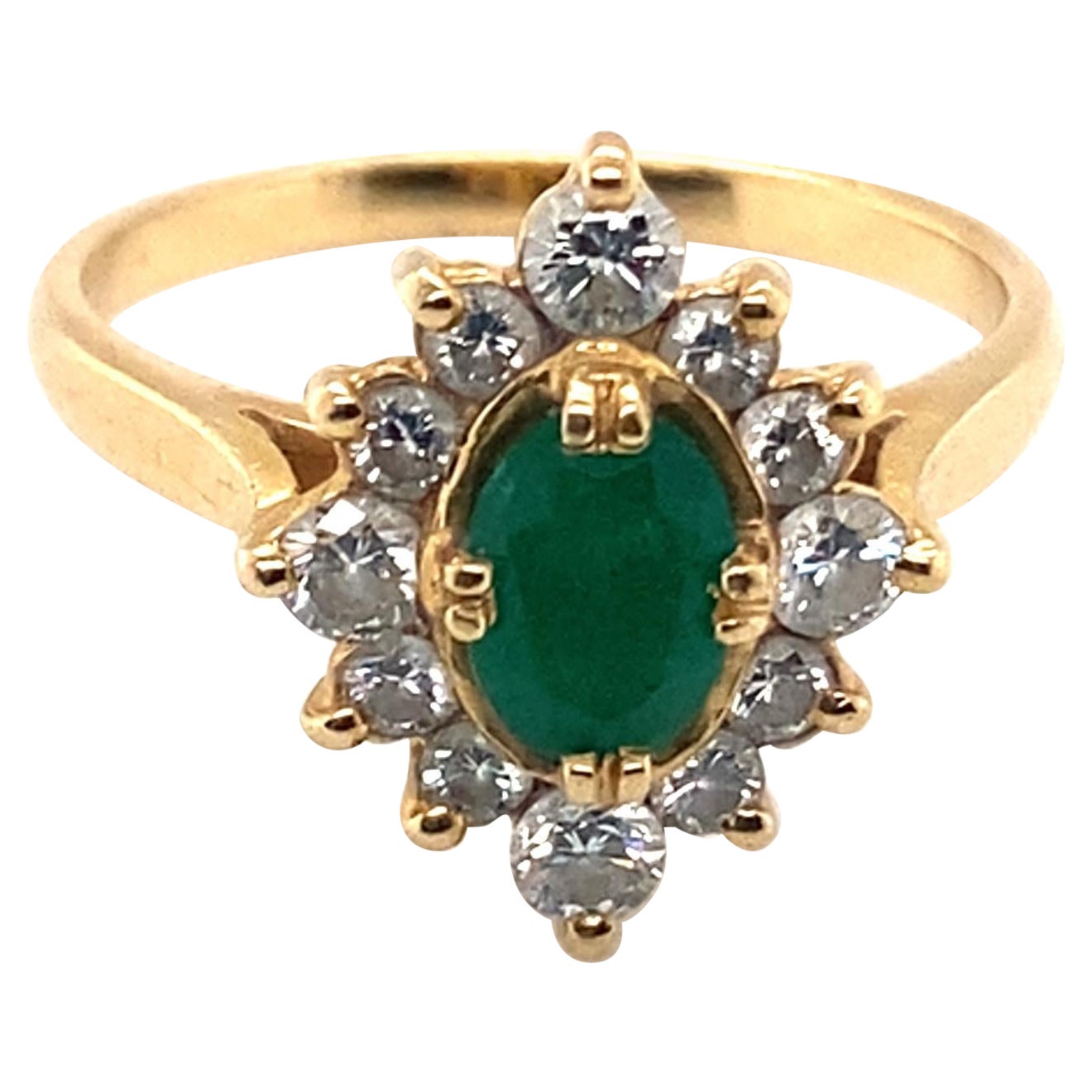 Anillo de cóctel de oro amarillo de 18 quilates con esmeralda y diamantes de los años 80