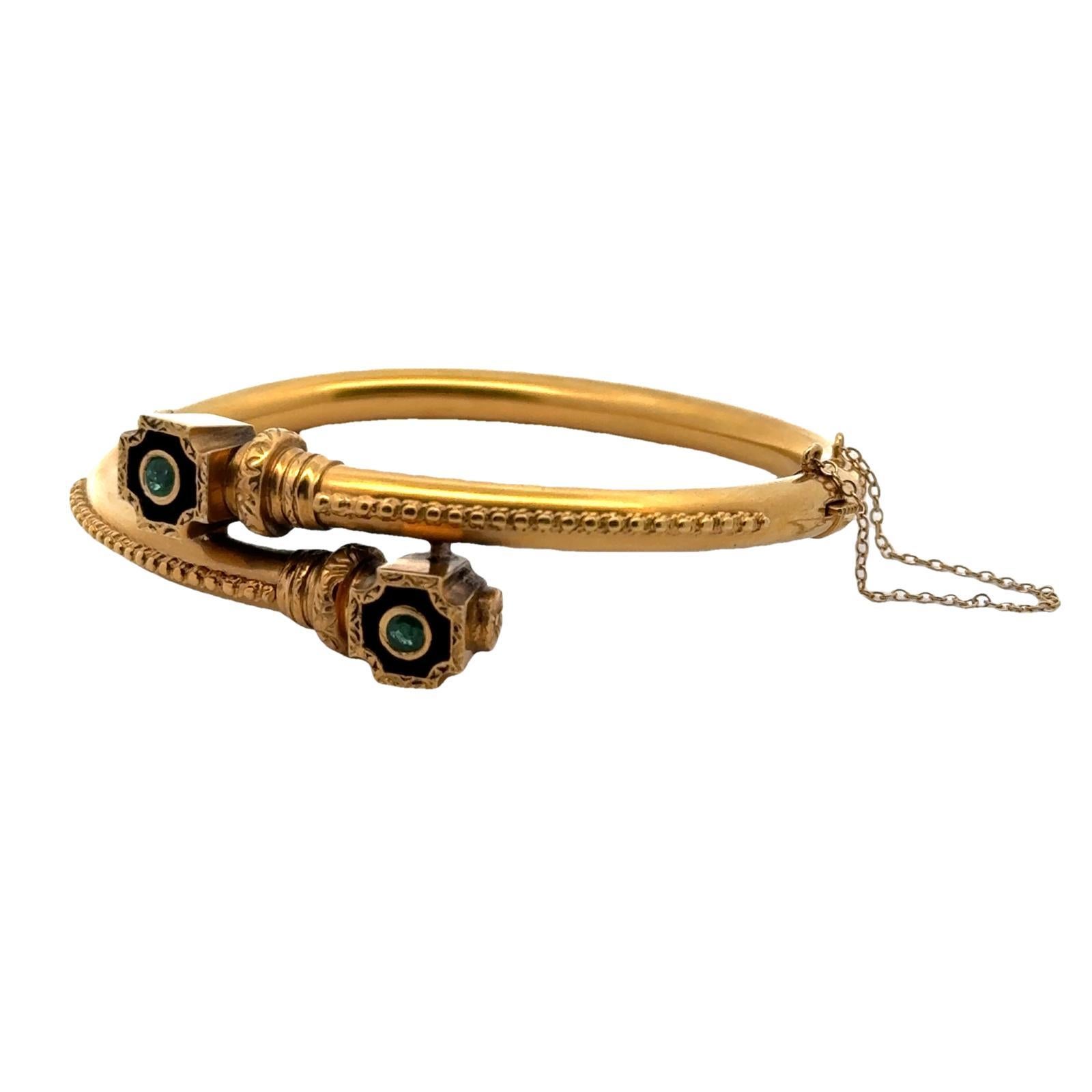 1980er Jahre Bypass-Armreif aus 14 Karat Gelbgold mit Smaragd und schwarzer Emaille (Rundschliff)