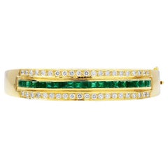 1980s Emerald Diamond 18K Gold Elegant Bangle Bracelet