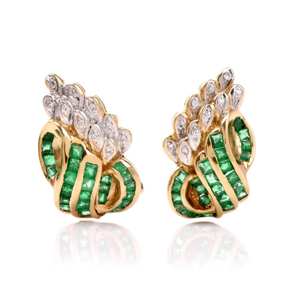 These earrings with emeralds and diamonds are crafted in 18-Karat yellow gold, weigh 9.2 grams and measure 20 x 12 mm. The vividly colored earrings of botanically inspired design depict romantically scrolled stems simulated by channel-set square-cut