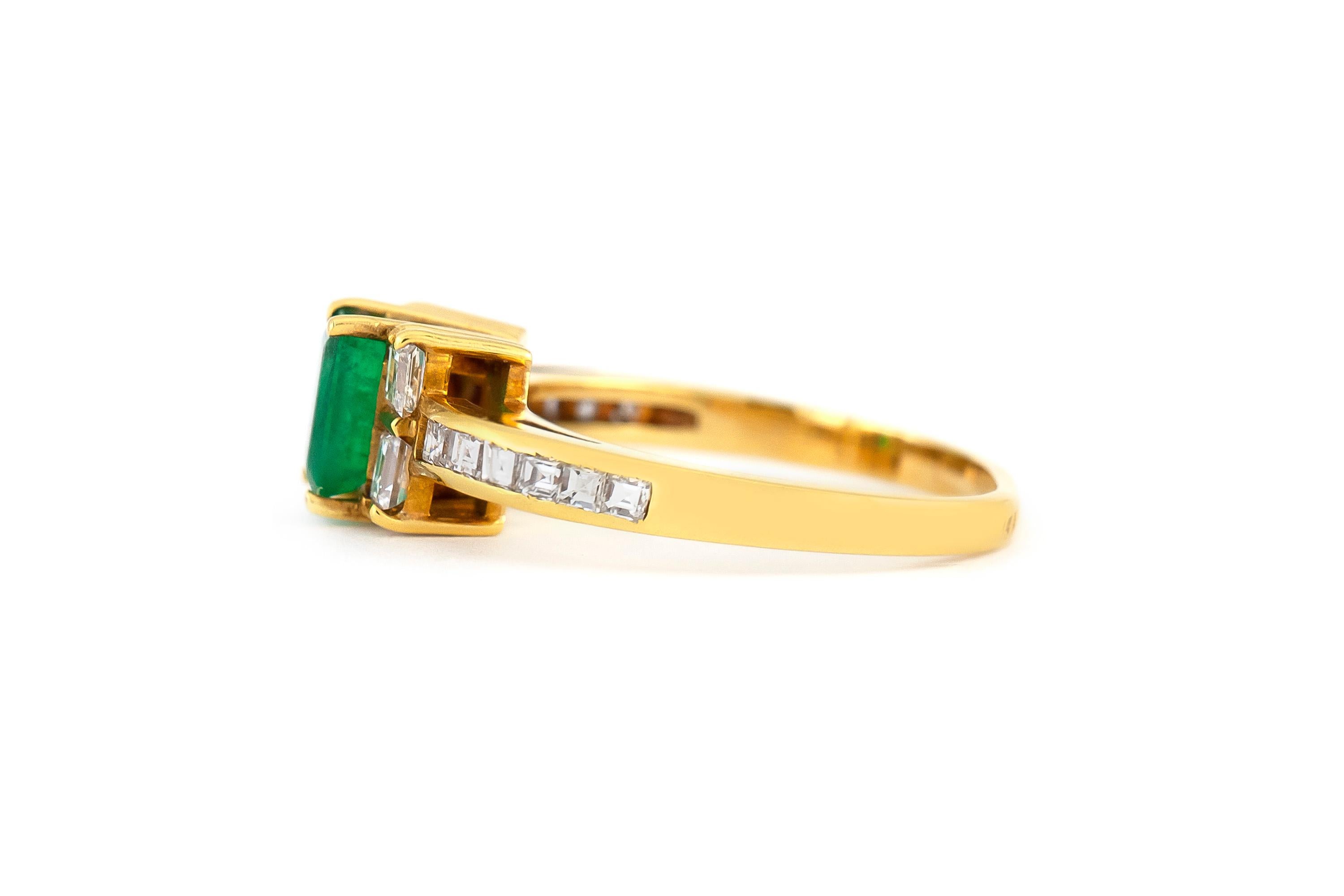The ring is finely crafted in 18k yellow gold with center emerald emerald cut weighing approximately total of 0.80 carat and diamonds emerald cut and square cut weighing approximately total of 1.00 carat.
Circa 1980.