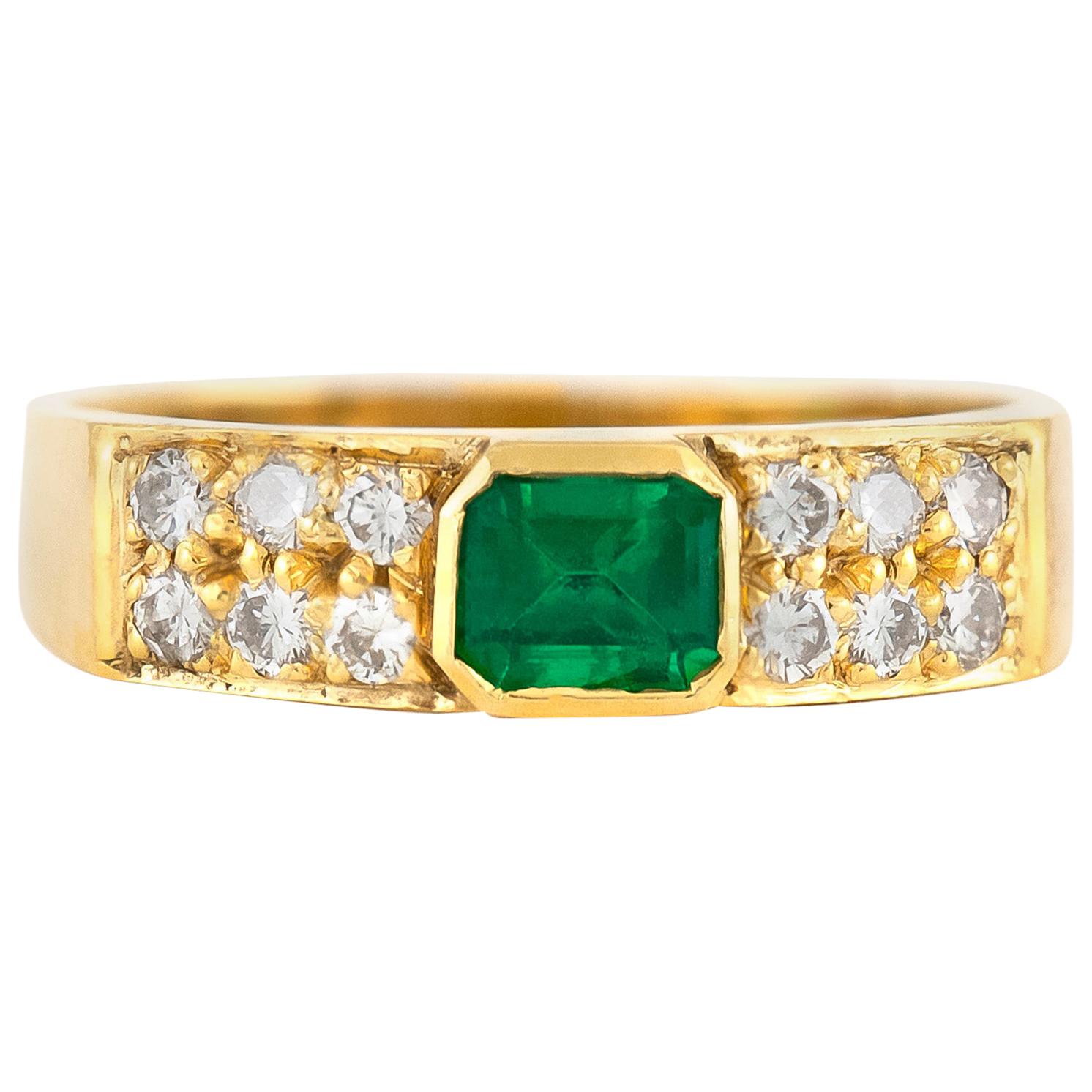1980s Emerald with Two Rows of Round Diamonds Ring For Sale