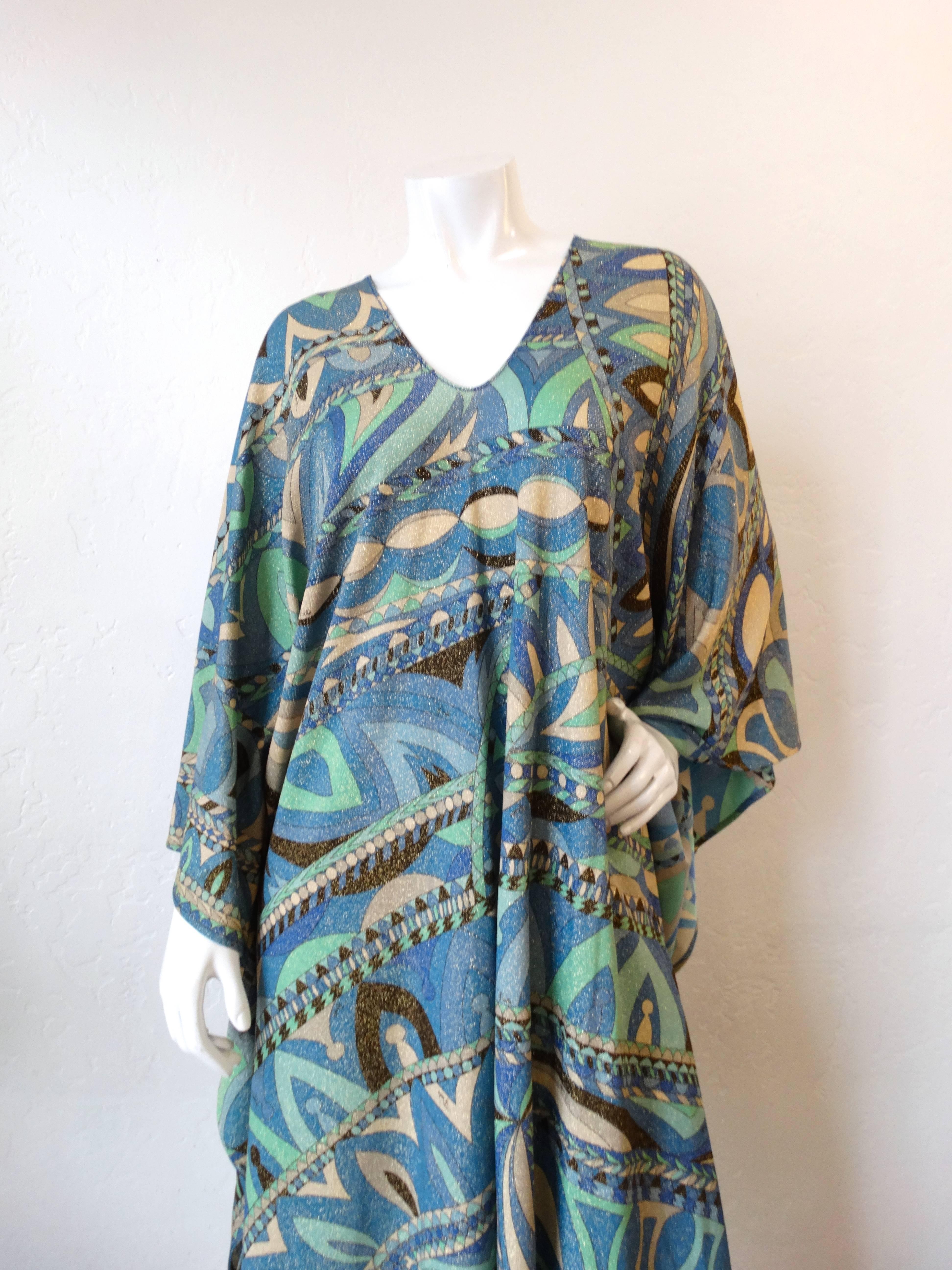 It doesn't get any more Pucci than this amazing 1970s Emilio Pucci geometric printed kaftan! Made of a glitzy, glittery lurex fabric with incredible blue geometric pattern. Kaftan style fit, v neckline, maxi length with angel wing sleeves. Rock this