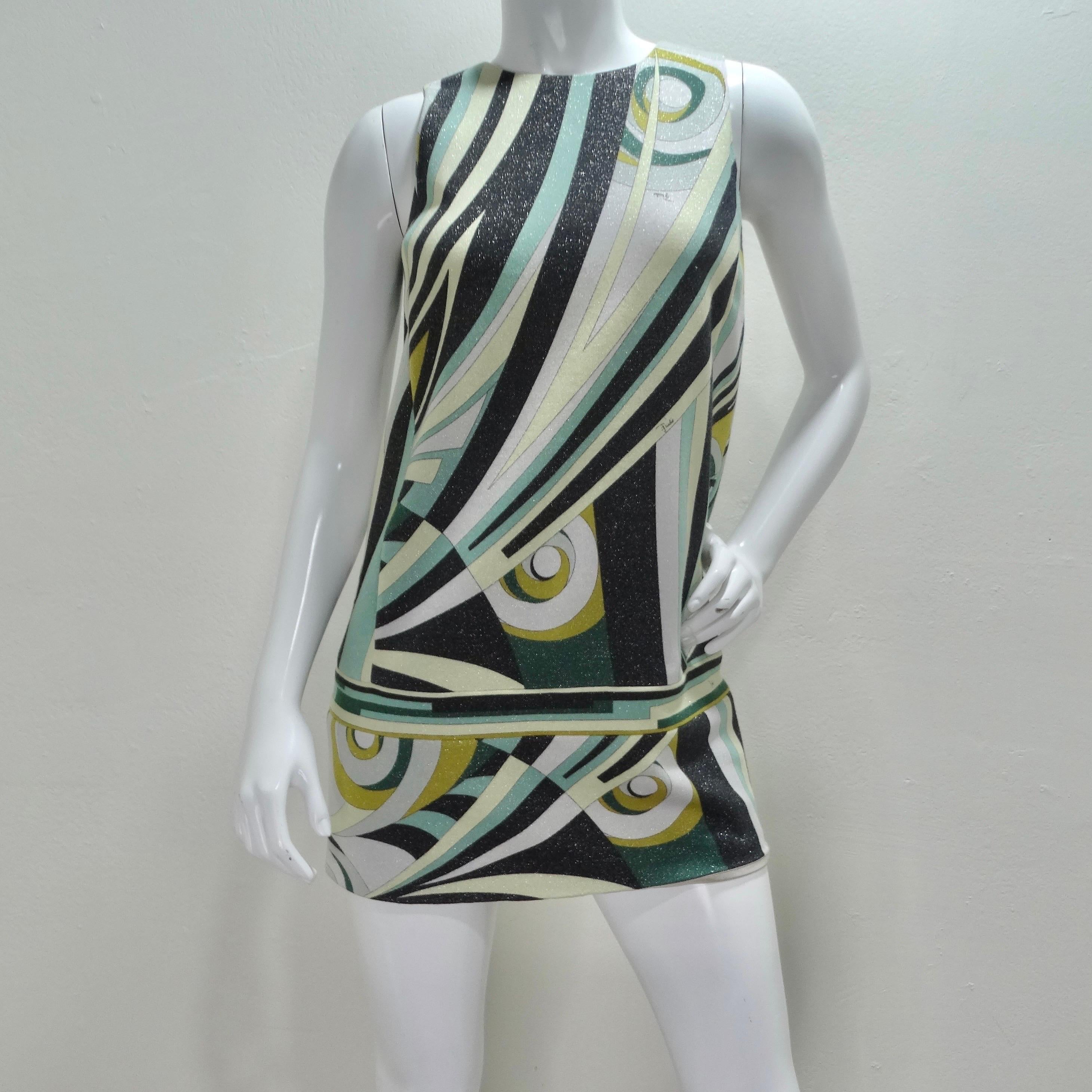 This 1980s Emilio Pucci mini dress is sooo mod! The perfect mini dress for any occasion, get a look at this incredible straight cut dress in a signature Pucci whimsical print with hidden pockets at the center! The pockets are the finishing touch and