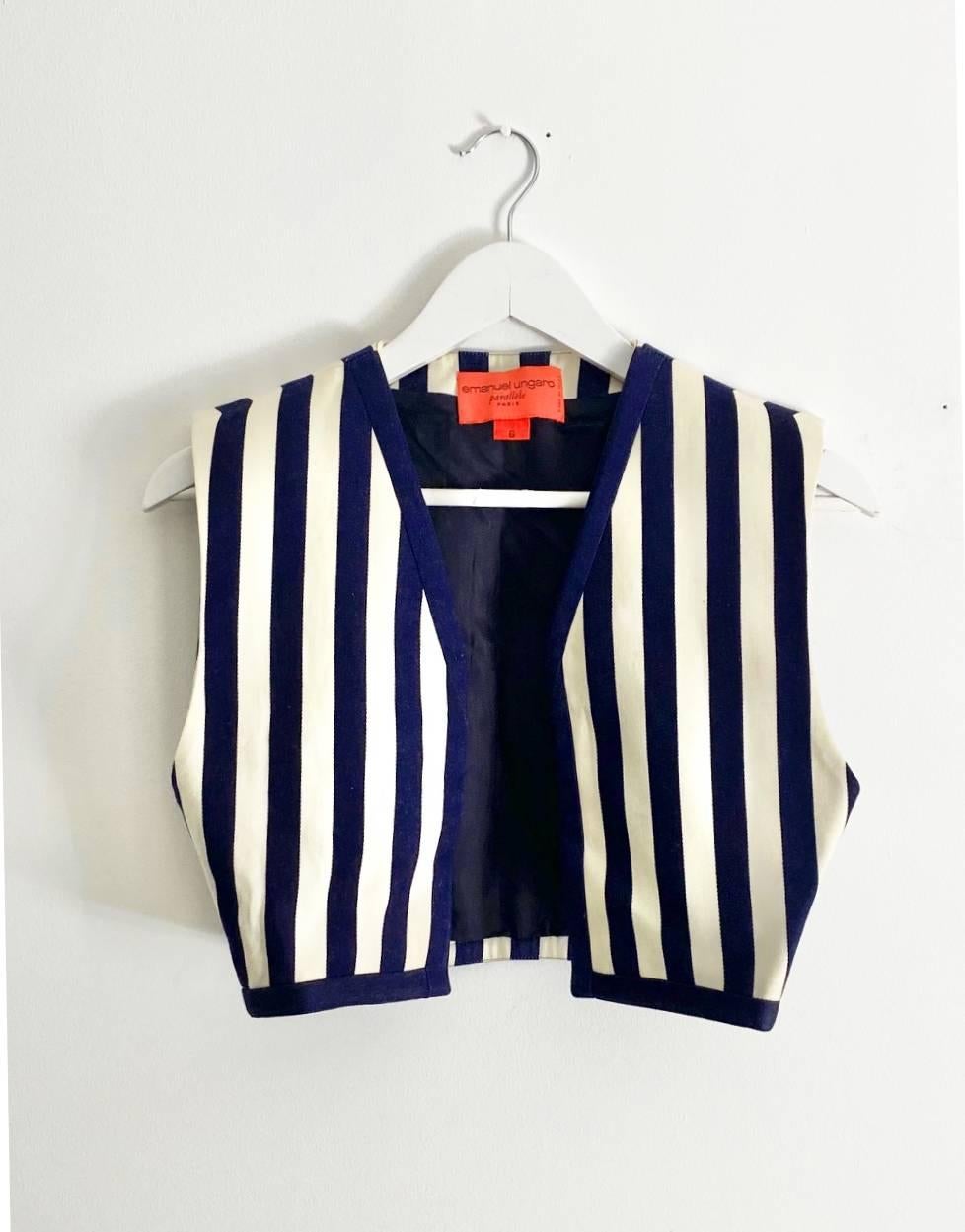 Emmanuel Ungaro cropped sleeveless cropped waistcoat, Navy Blue and Ivory vertical stripe print, silk lining

Size: 40 IT /  8 UK /  0-2 USA 

Measurements: 
- shoulder to shoulder: 39cm / 15.3'
- armpit to armpit: 48cm / 18.8'
- waist - side to