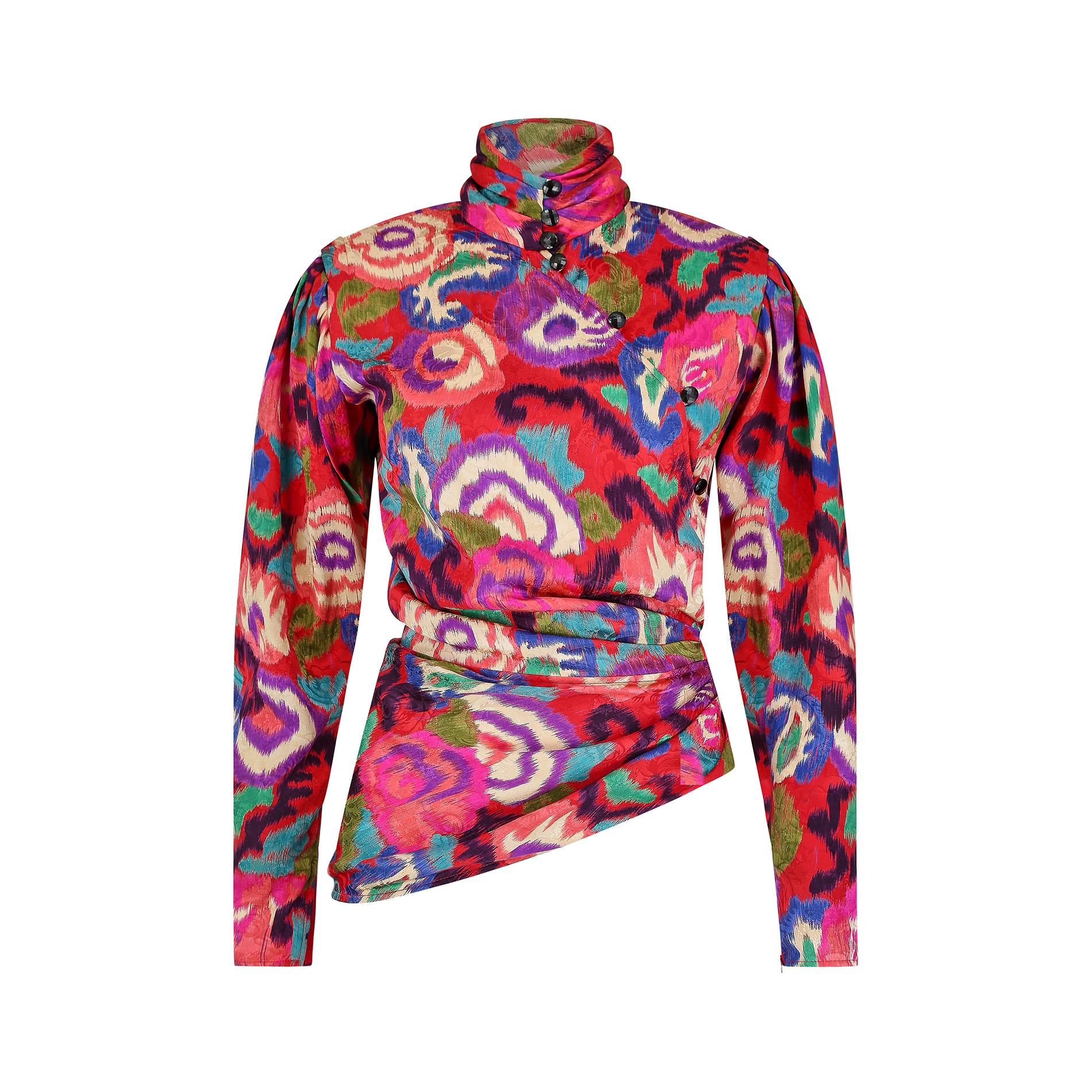 Fabulous silk asymmetric jacket by Emmanuel Ungaro, circa 1986, in a colourful abstract floral print. This was a signature look of the designer and was revisited throughout the collections of the mid 1980s to early 1990s in a dazzling array of