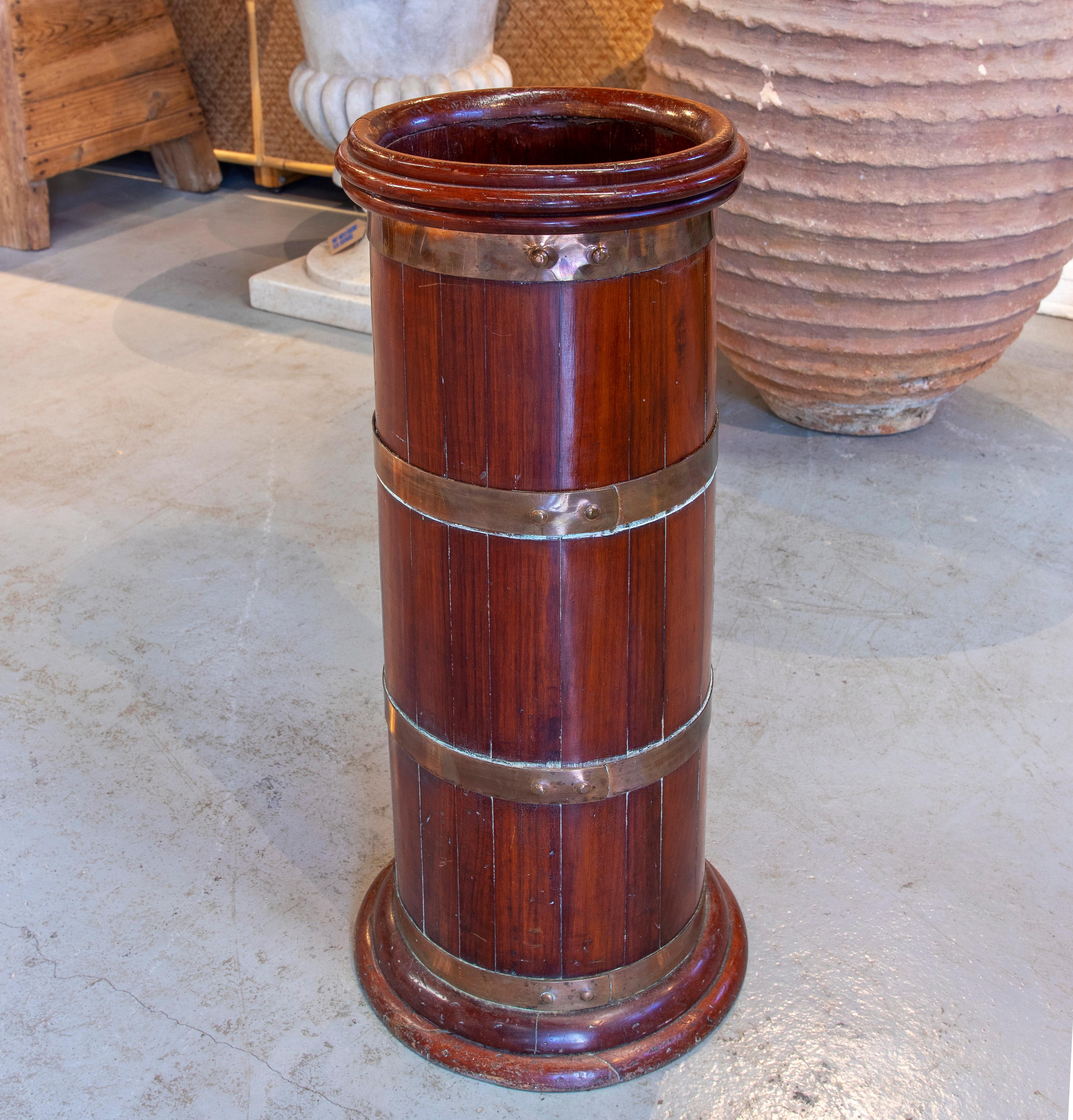 Vintage 1980s English mahogany and bronze barrel shaped umbrella stand.