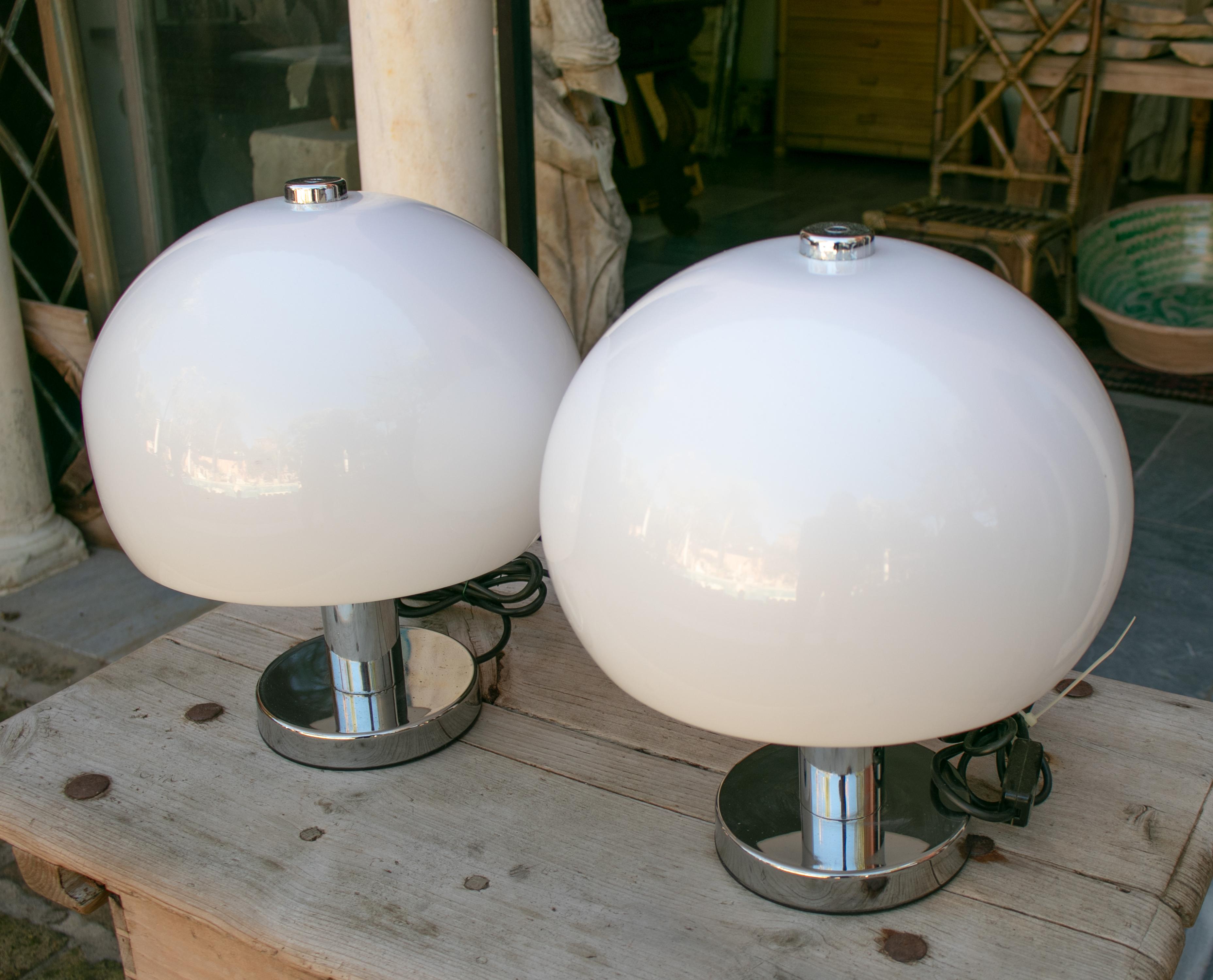 1980s English pair of metal table lamps with white lamp shade.