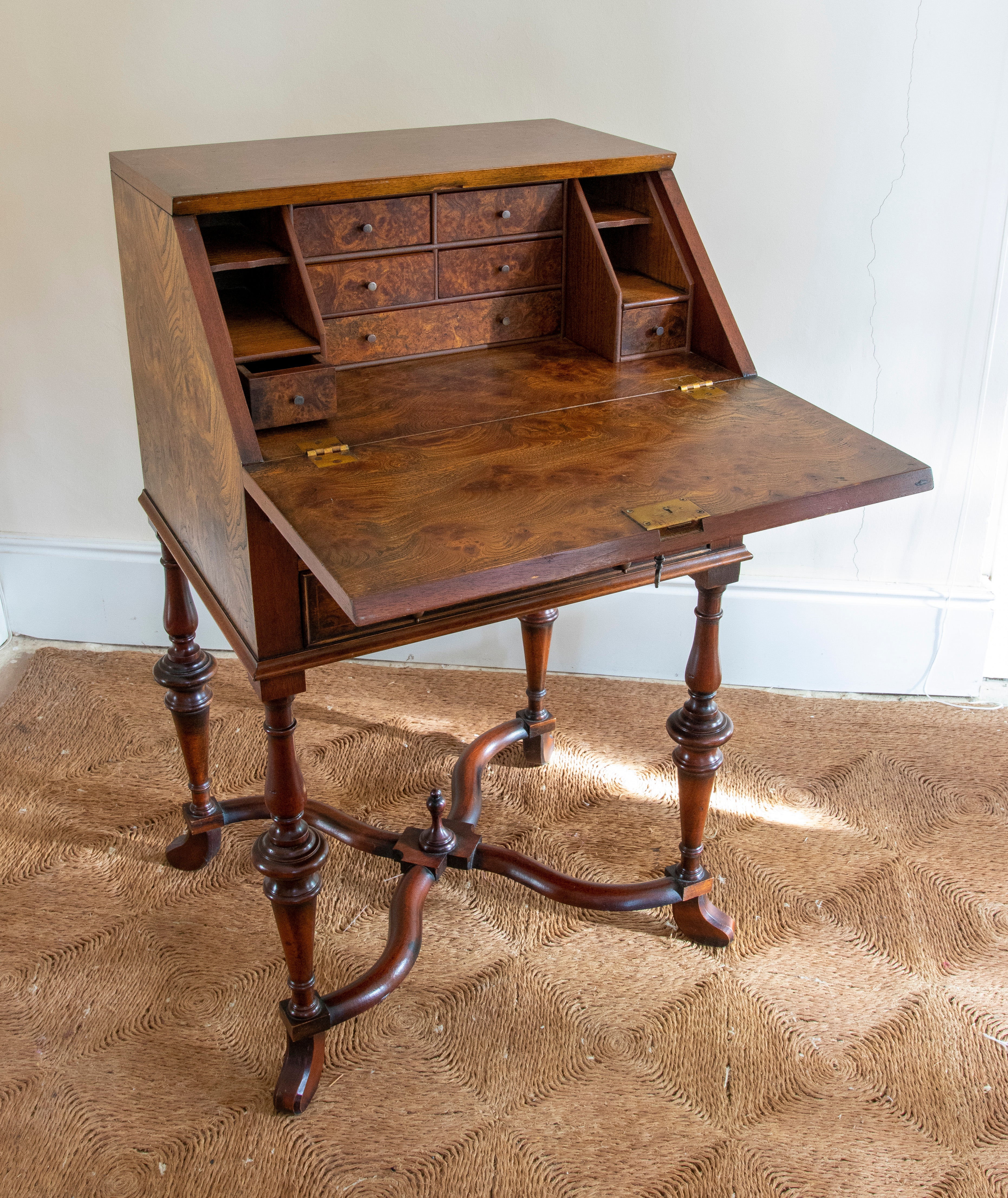 1980s English root wood writing desk with door and drawers.