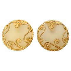 1980s Escada Large Matte Resin Clip-On Earrings With Ornate Gold Tone Detailing