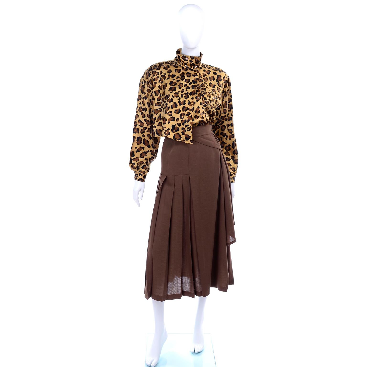 This is an incredible 2 piece Escada ensemble designed by Margaretha Ley in the 1980's. This outfit came from an estate of clothing we handled that included the best of the 1980's and many unique Escada pieces.  This has a chocolate brown wool poly