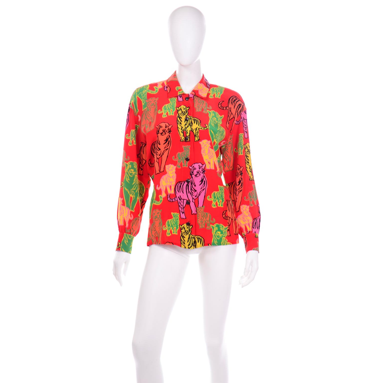 This fun blouse from Escada was designed by the late Margaretha Ley during the 1980s. Ley was passionate about novelty prints, especially those with animals, a recurring theme in her creations. This iconic print stands as one of Escada's most