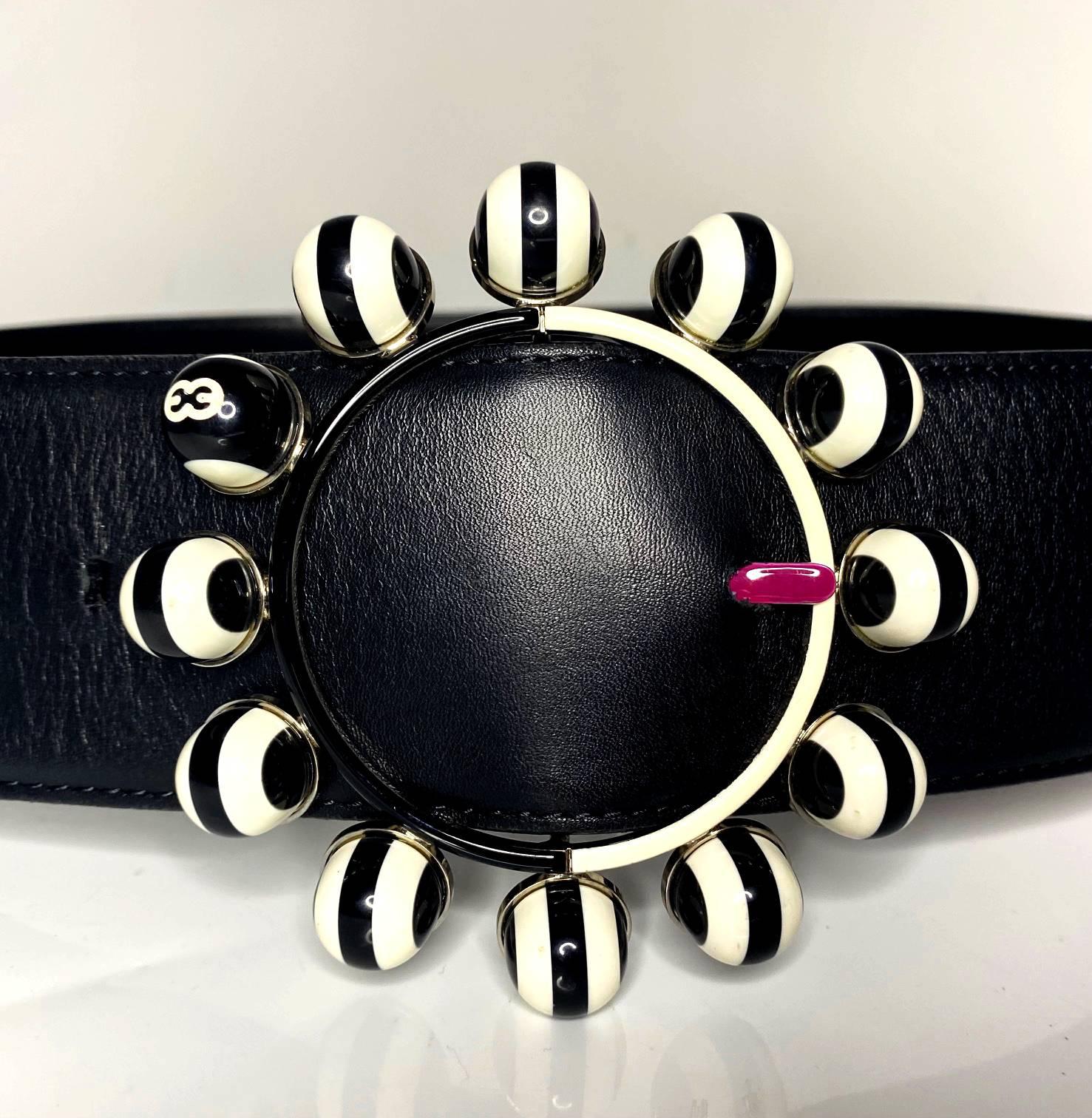 Rare Escada novelty belt from the 80s featuring snooker balls mounted on metal buckle, belt on shiny leather ,Made in Italy  High-quality Italian leather and metal components make this a timeless fashion accessory that is sure to last.
Size: 42