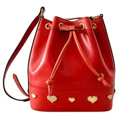 1980s Escada Red Leather Gold Metal Heart Drawstring Bag