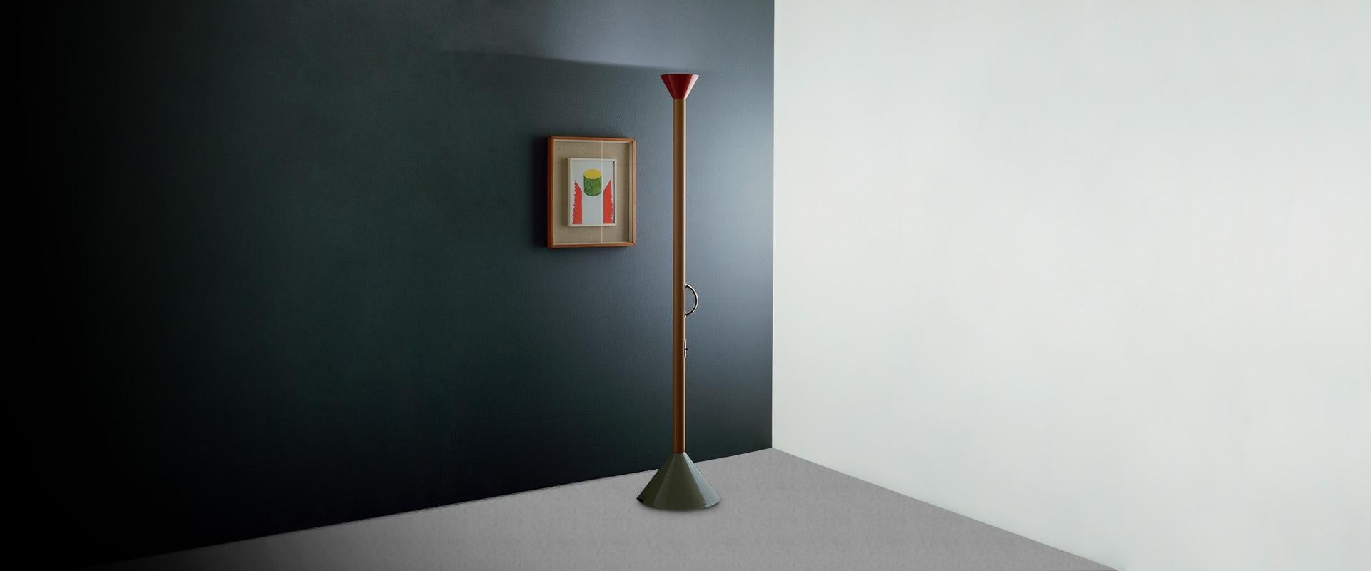 Ettore Sottsass Callimaco floor lamp for Artemide. 

Originally created in 1982, Ettore Sottsass’ “horn” of light creates the remarkable illusion of an oversized musical instrument. This iconic floor lamp from Ettore Sottsass was reintroduced to the