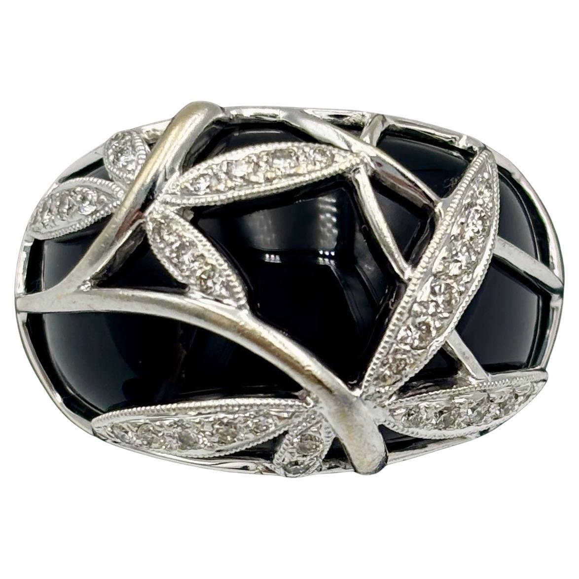 1980s European 18k gold, onyx and diamond ring