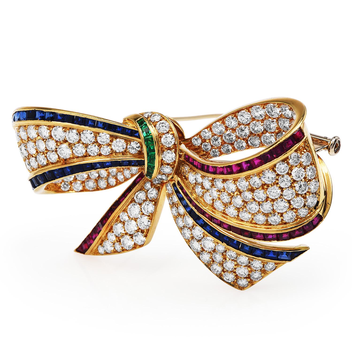 Large Diamond Multi Gem Sapphire Emerald Ruby 18k Gold Bow Pin Brooch.

Dazzle yourself with this 1980S Diamond multi gems 18k yellow gold Vintage Bow Brooch pin. 

They are exquisitely crafted in solid 18k yellow gold, weighing approx.