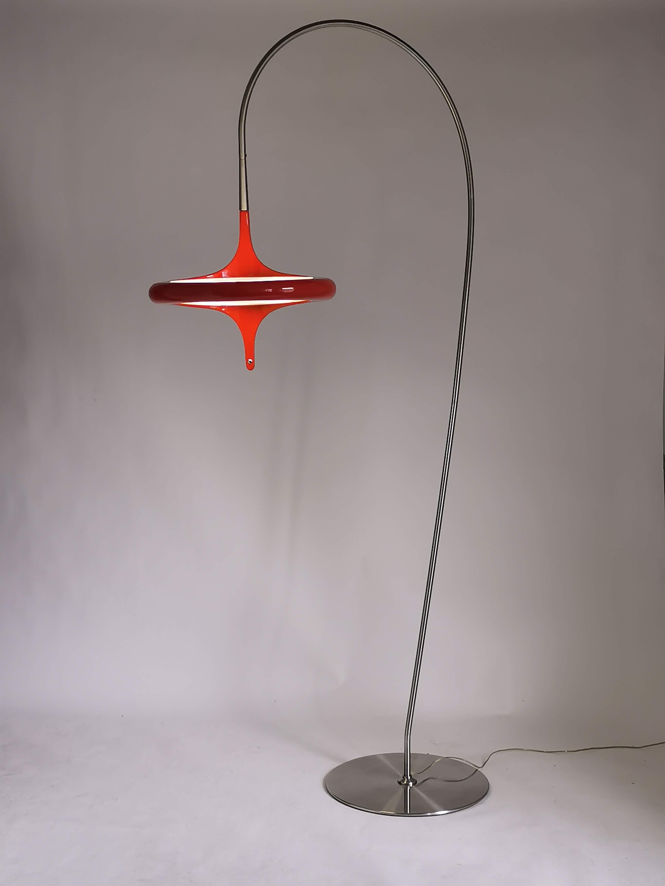 Massive sensuous shaped red acrylic shade with opale diffuser on top and under. 

Shade pivot a full 360 degree and measure 20 in. wide by 18 in. high. 

Lighting is provided by a round fluorescent tube with a North American 120 voltage system and