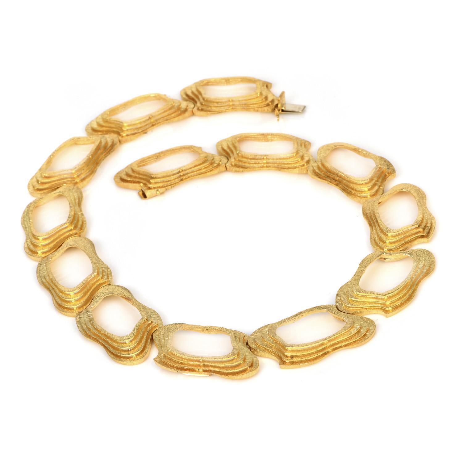  The perfect way to enhance the look for that special woman. 

This Italian estate necklace is crafted in solid 18K yellow gold, this exquisite piece has 13 open links, fancy cushion-shaped, with a stacked textured design finely made in luxurious