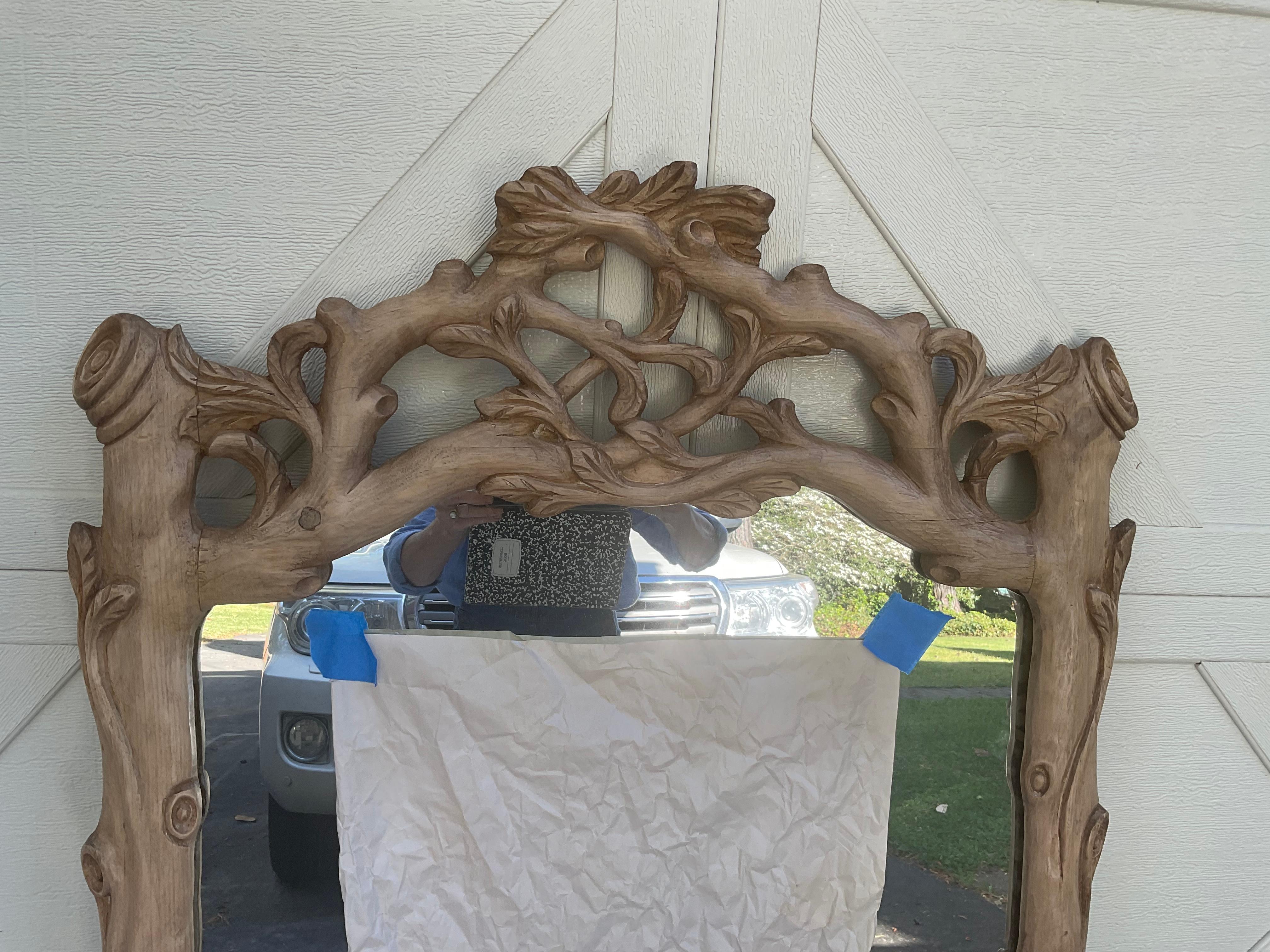 I am a big fan/ buyer of mirrors. I have never seen this particular version before. It is hand carved, Italian from the 1970-80s and has a wonderful faux boos frame. The piece is pine but I stripped, bleached, and then waxed the pine. I love the way