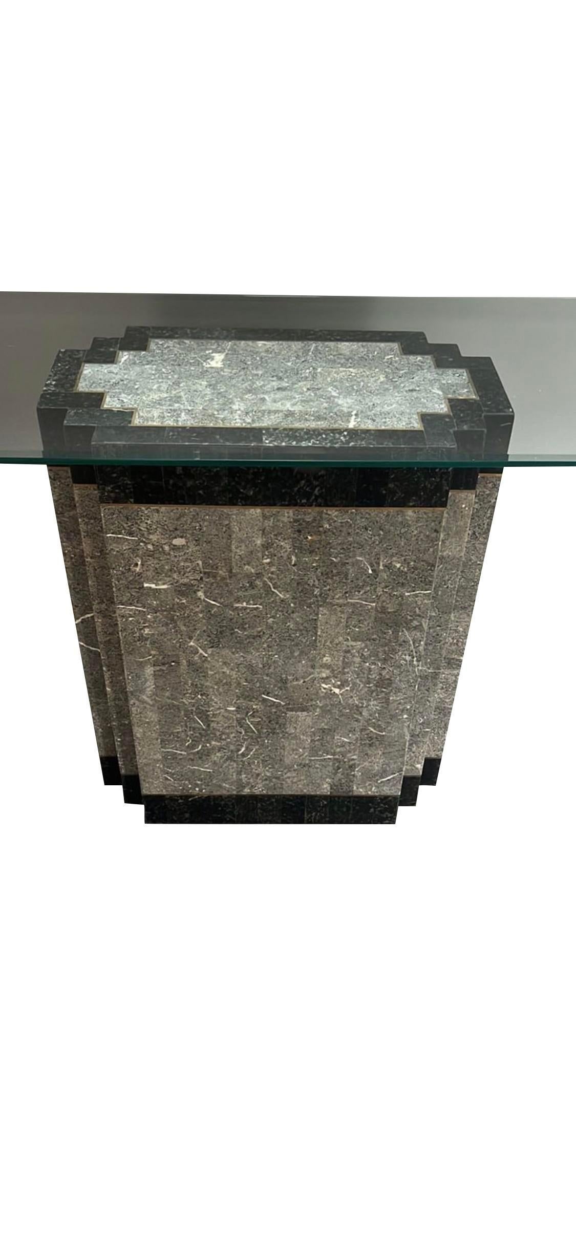 Faux Marble Modern Tessellated Deco Console Glass Table.

Add a touch of glamorous style to your home with this stunning faux marble modern tessellated deco console glass table. The intricate tessellated design and rich color palette create a