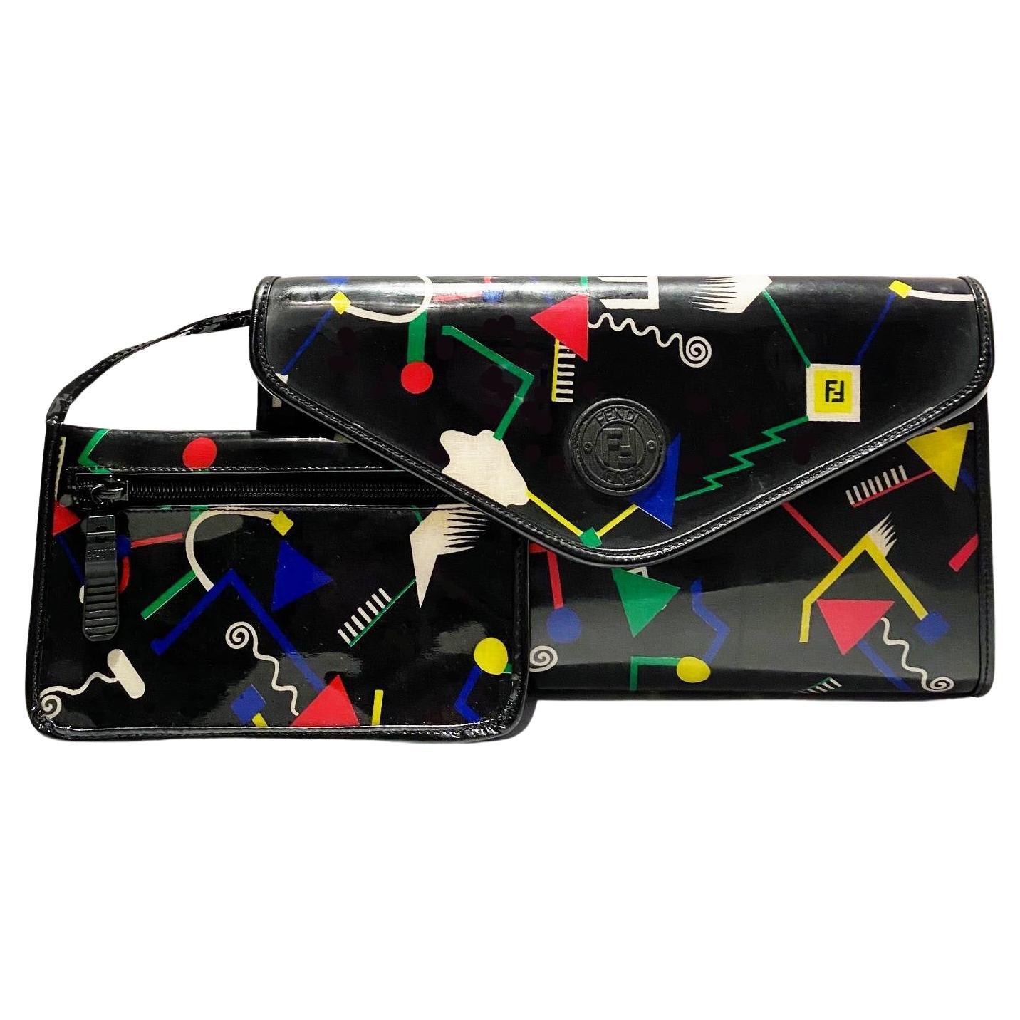 Rare Fendi envelope bag from the 80's, pop abstract print on vinyl canvas, strap closure, internal coin zipped purse.

Condition: 1980s, vintage excellent 

Measurements: 28.5x17.5 x 8 cm