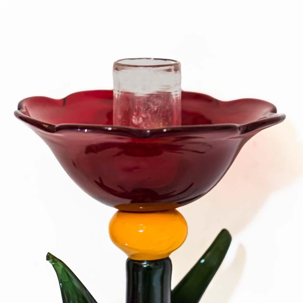 An unique and very beautiful art studio Murano blown glass candlestick in blue, green and red and yellow rim shaped blown glass signed by Silvano Signoretto, 1980s.
