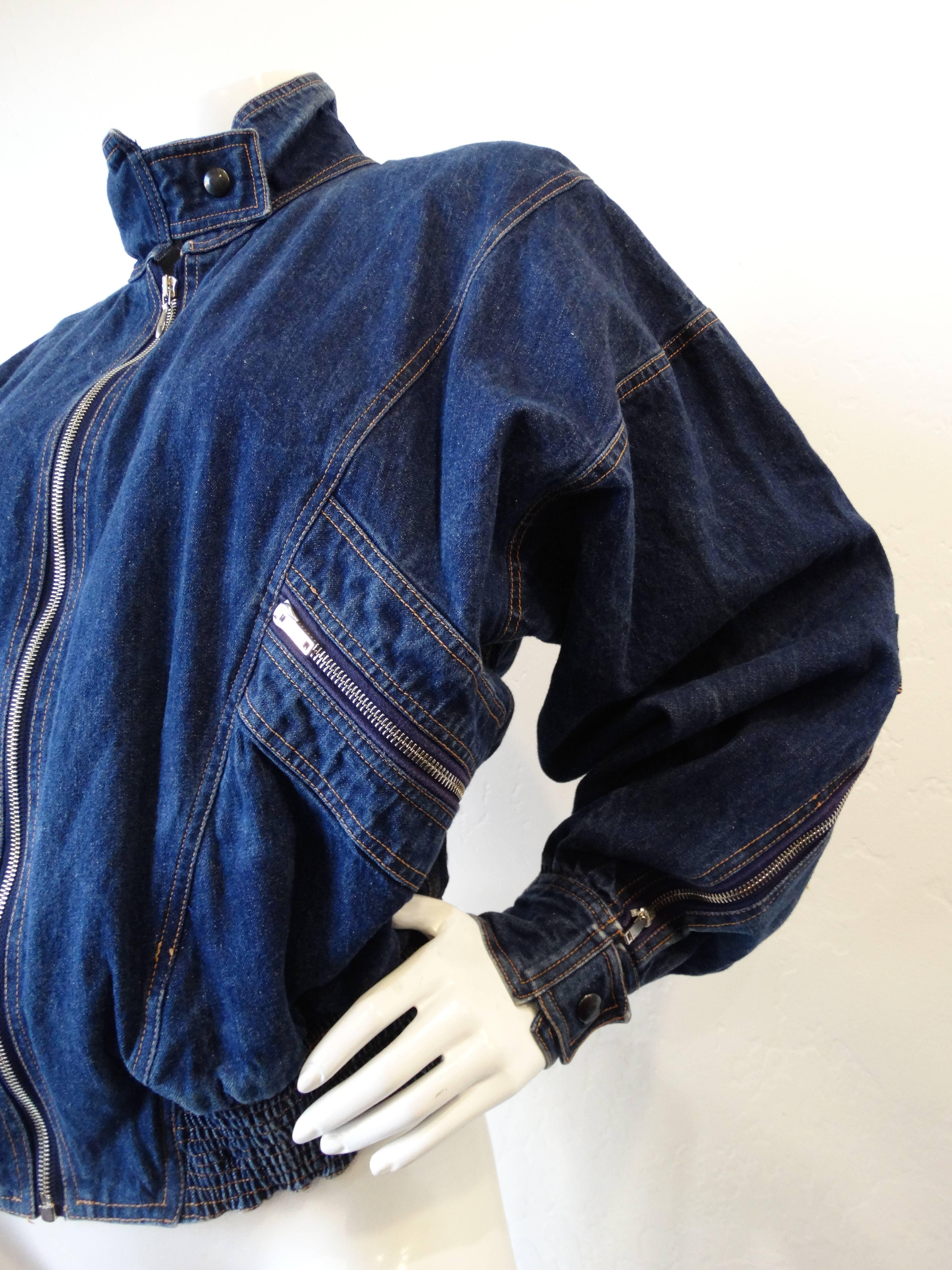 Arguably our favorite 1980s trend- the bomber jacket! This amazing denim jacket was designed by Amsterdam designer, Fong Leng! Made of a soft true blue denim with contrasting yellow stitching throughout. Classic bomber fit with oversized sleeves,
