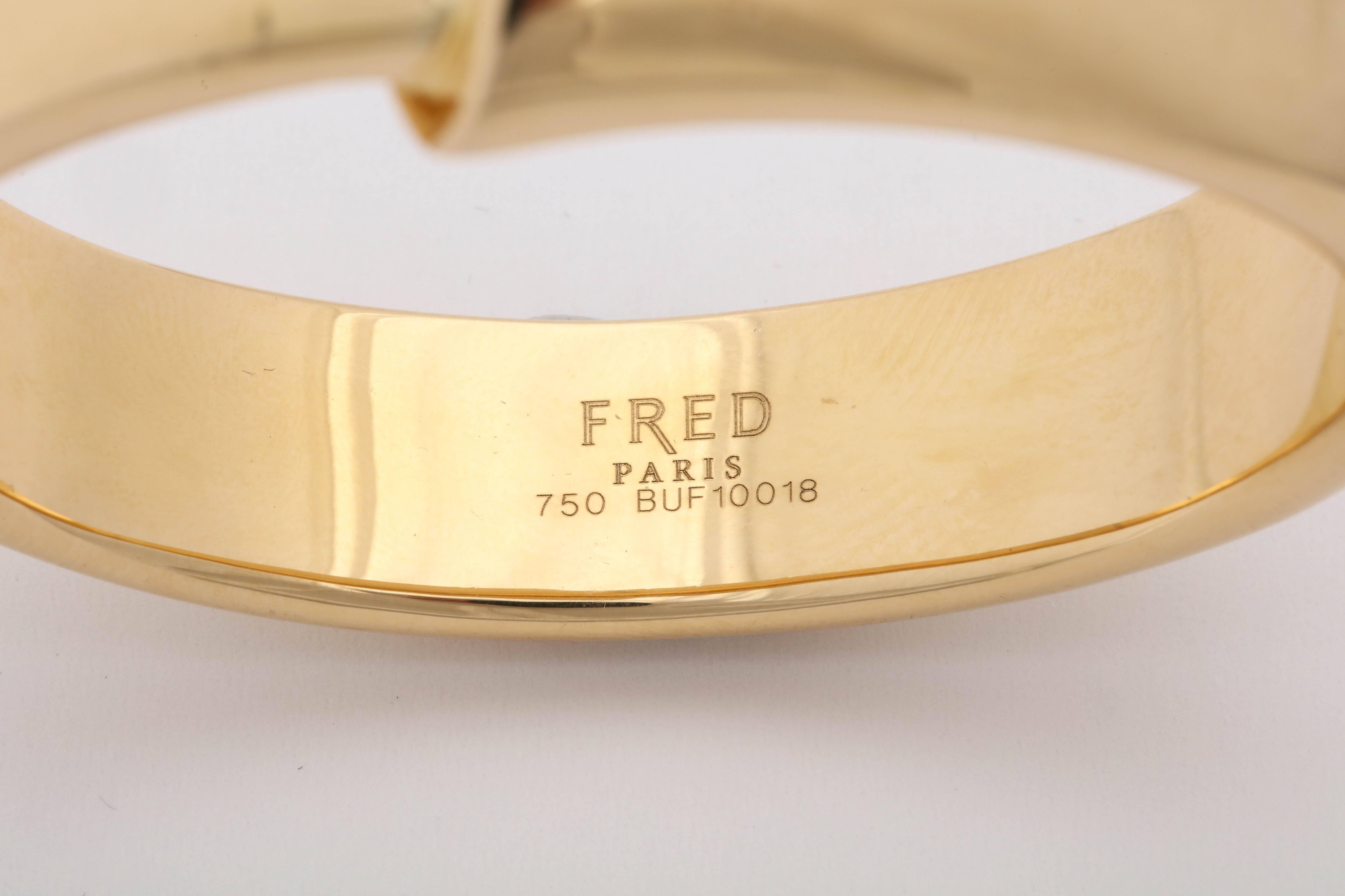 1980s Fred Paris Chic and Sculptural High Polish Gold Bangle Bracelet with Box In Good Condition In New York, NY