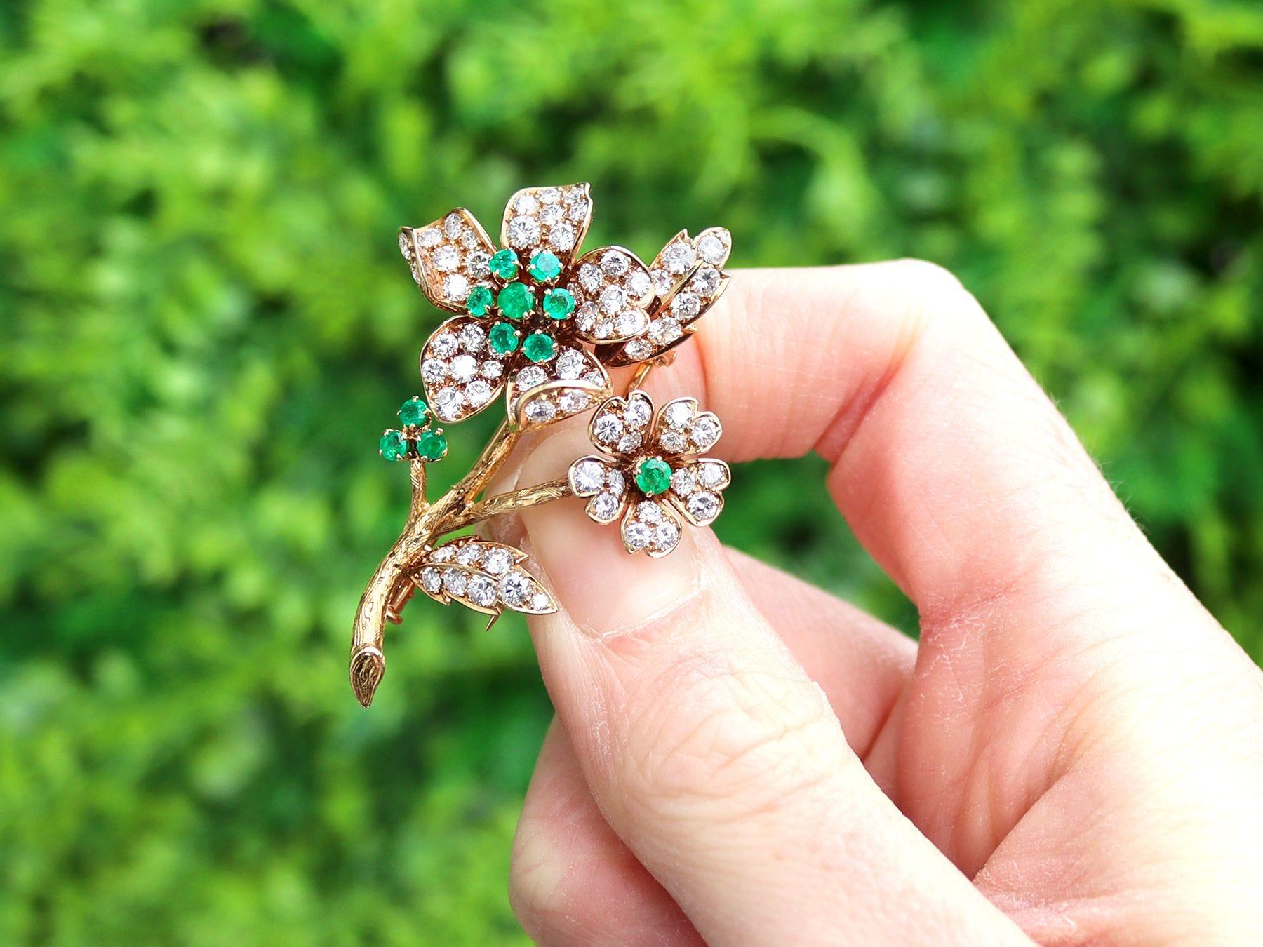 A stunning, fine and impressive vintage French 2.90 Carat diamond and 0.40 Carat emerald, 18k yellow gold flower spray brooch; part of our diverse brooch collection.

This stunning vintage emerald brooch has been crafted in 18k yellow gold.

This