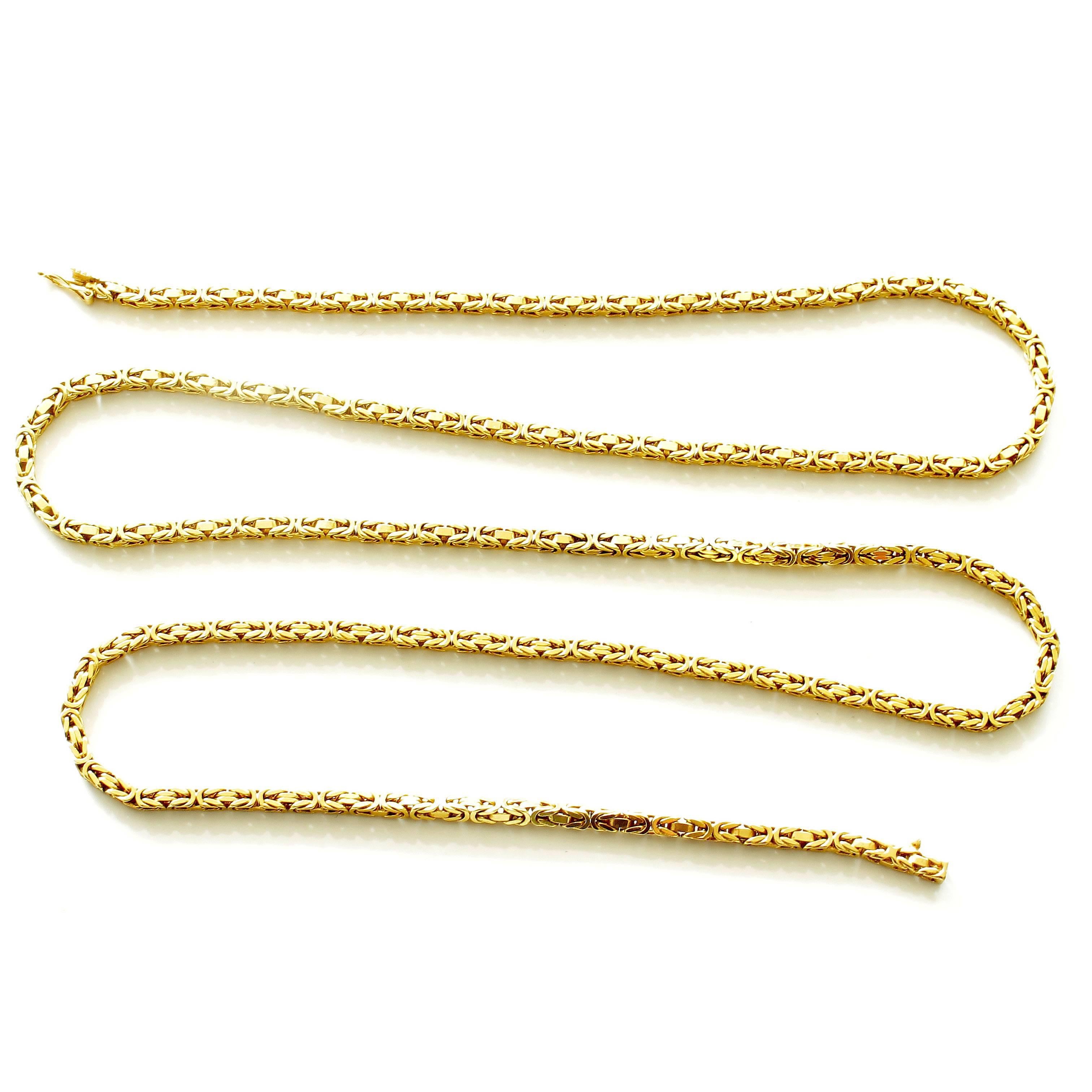 A timeless design to put the final touches on any outfit. Fashioned in braided glistening 18k gold. Stamped with French hallmarks. 31 inches long. Weighs 60.7 grams.