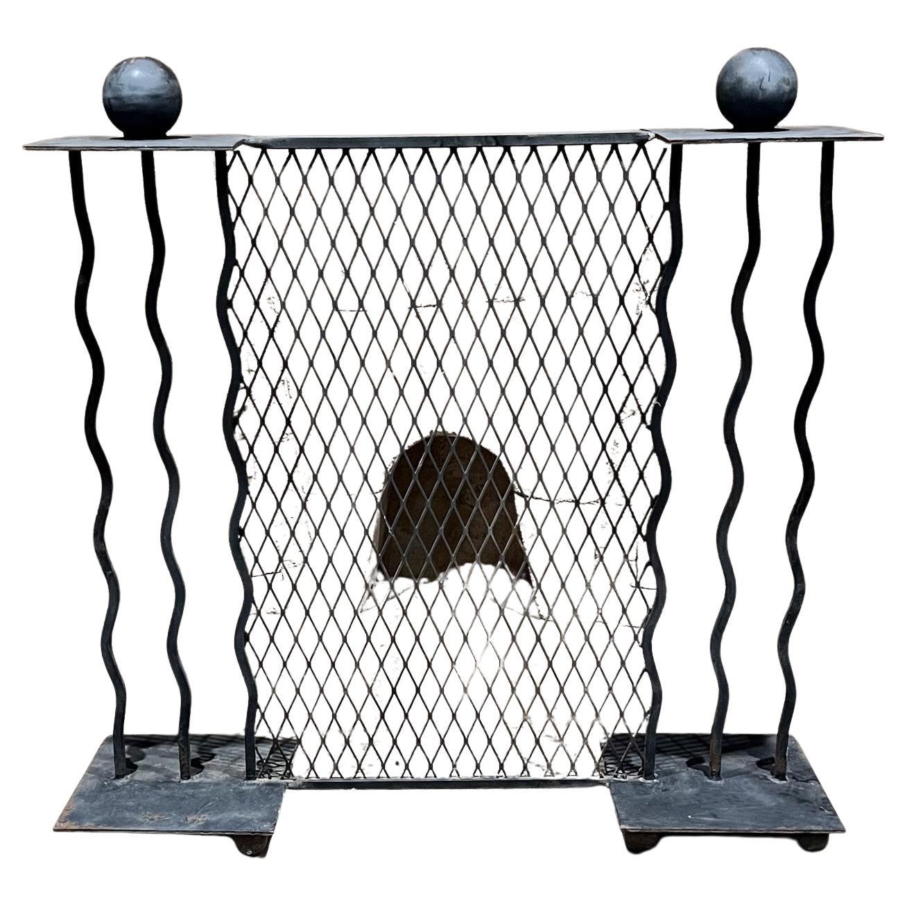 1980s Memphis Milano Squiggle Fireplace Screen Hand Forged Iron 
Handmade hand forged
Original vintage unrestored.
Original paint is faded, has light rust in some spots, yet 95% acceptable.
No label or mark present
42.5 h x 40.5 w x 12 d
Refer to