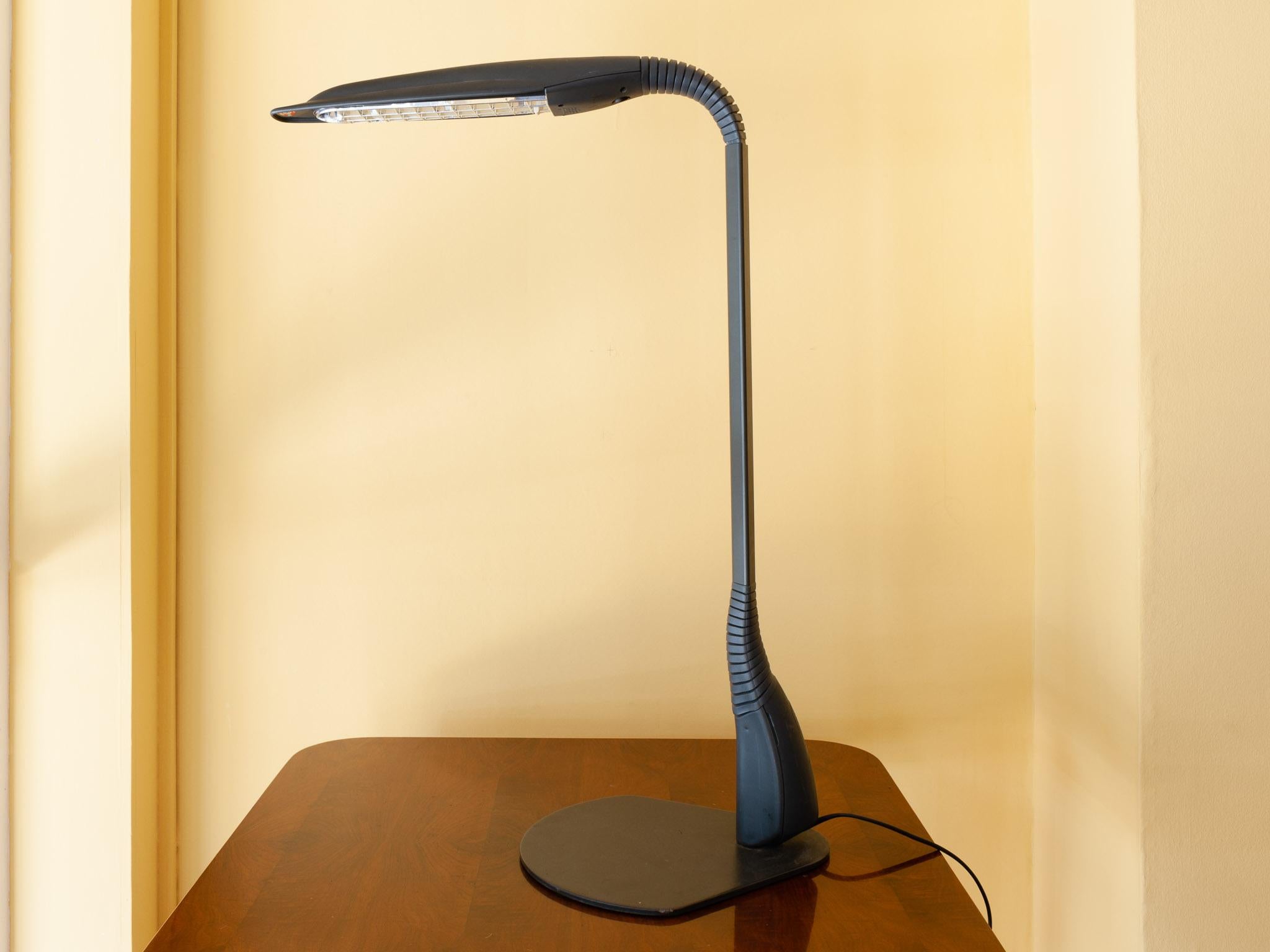 An interesting and unusual desk lamp designed in the shape of a Cobra snake. Designed in the 1980s in France by Philippe Michel for light manufacturer Manade. The desk lamp is flexible in two places which makes it very easy to direct the light to